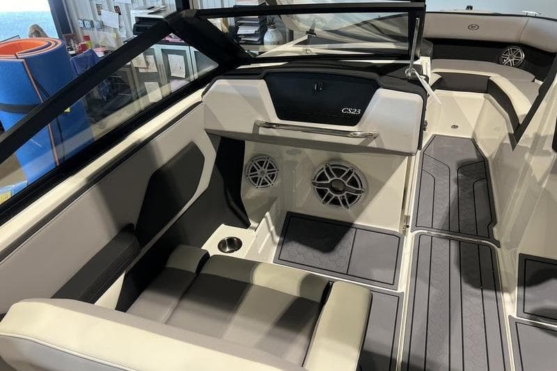2025 Cobalt CS23 Surf boat interior with modern seating and audio system.