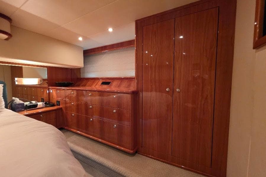 Luxurious wood-paneled cabin interior of 2008 Neptunus Flybridge MY yacht.