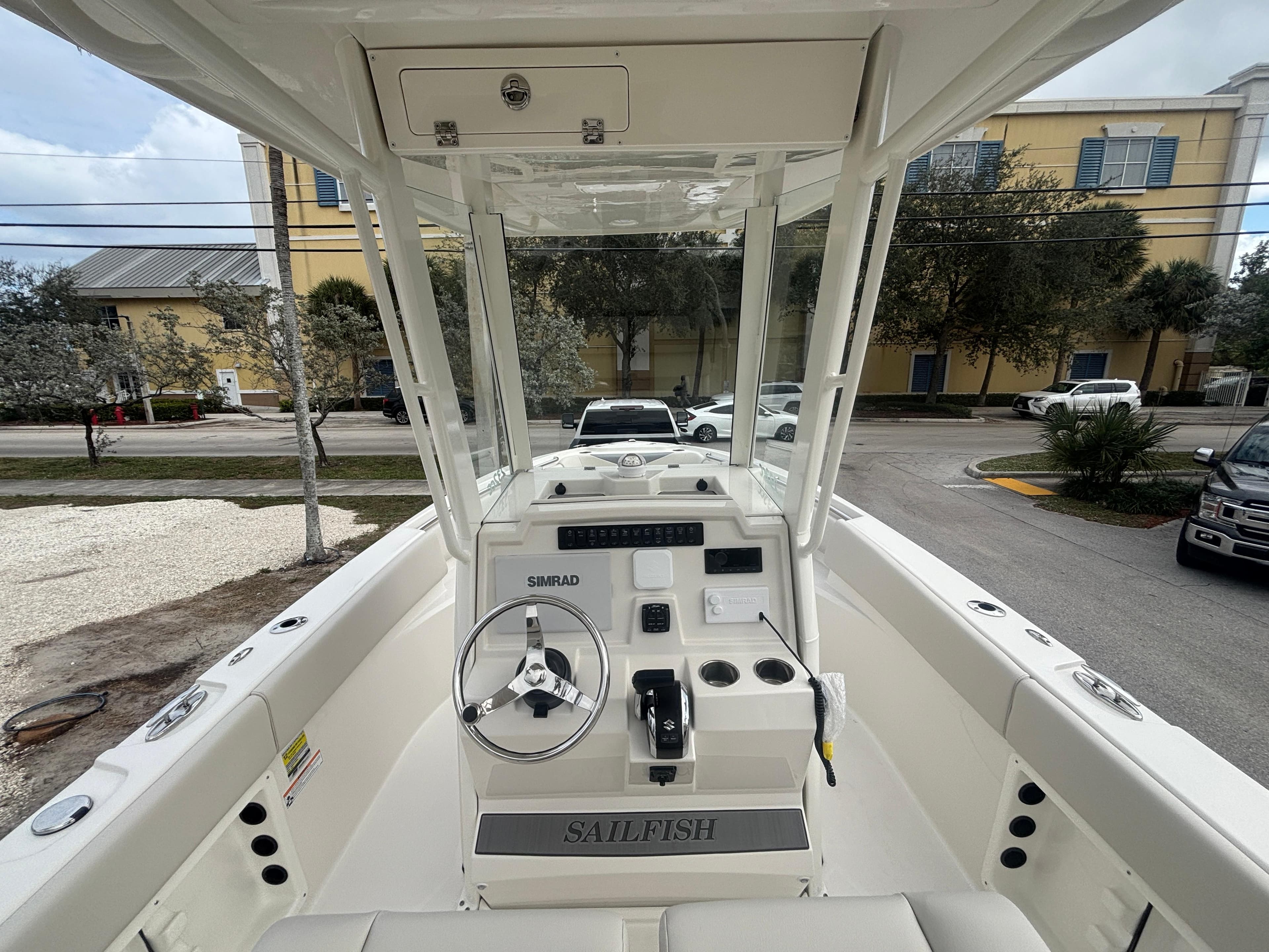 2025 Sailfish 232 CC boat interior with steering console and controls.