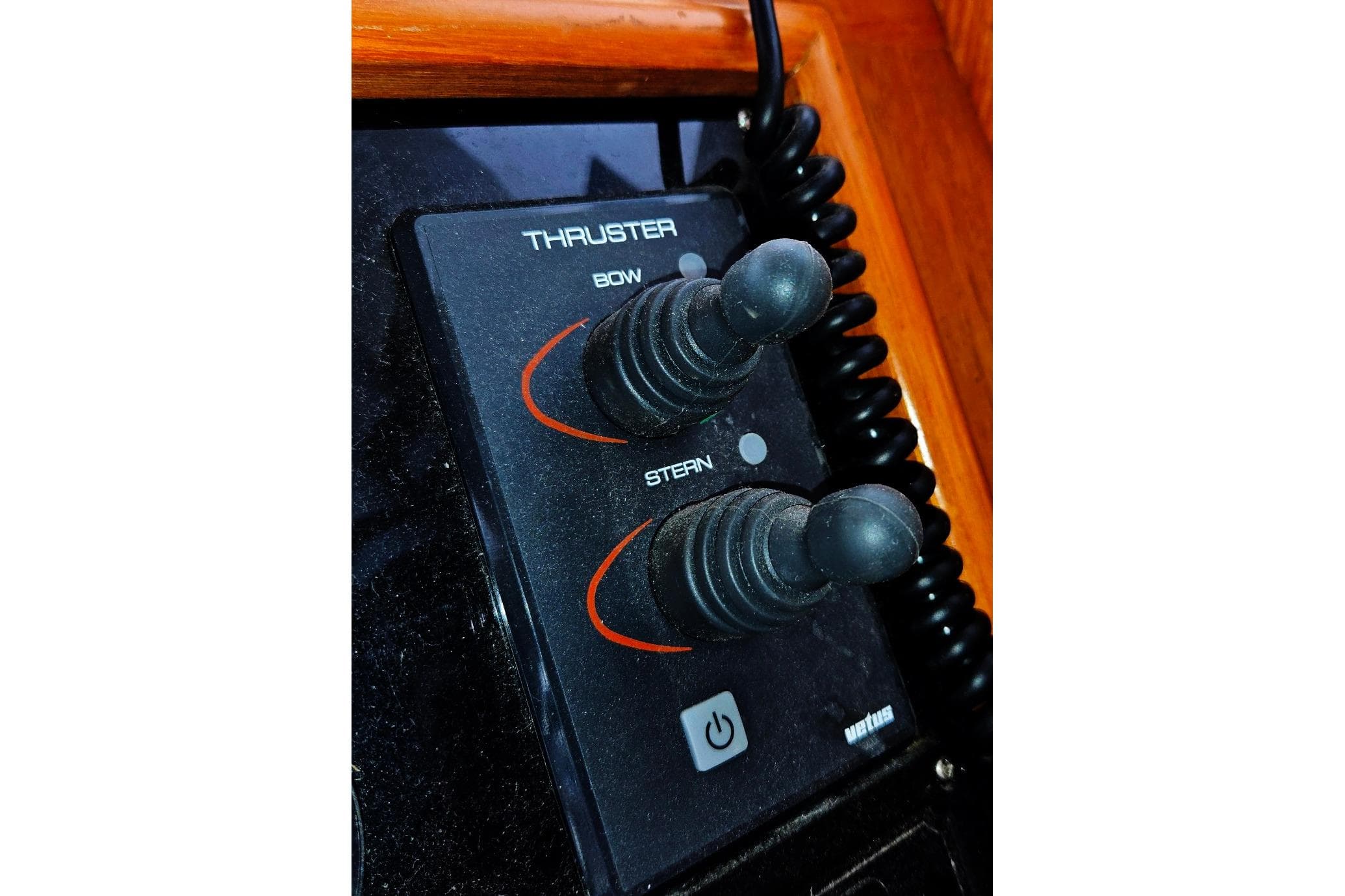 Control panel of 1993 Ocean Alexander 423 Classicco boat with thruster joysticks.