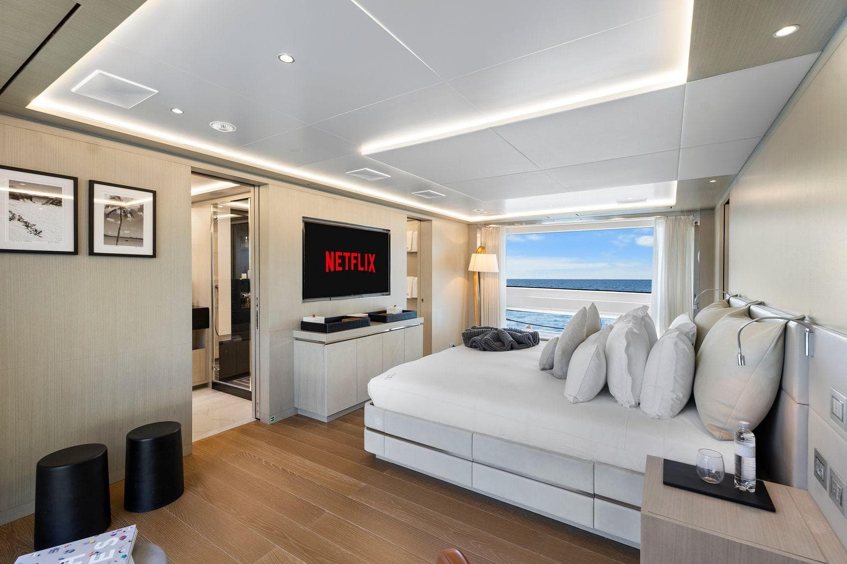 Luxurious Benetti 116 yacht bedroom, 2016 model, featuring ocean view and modern amenities.