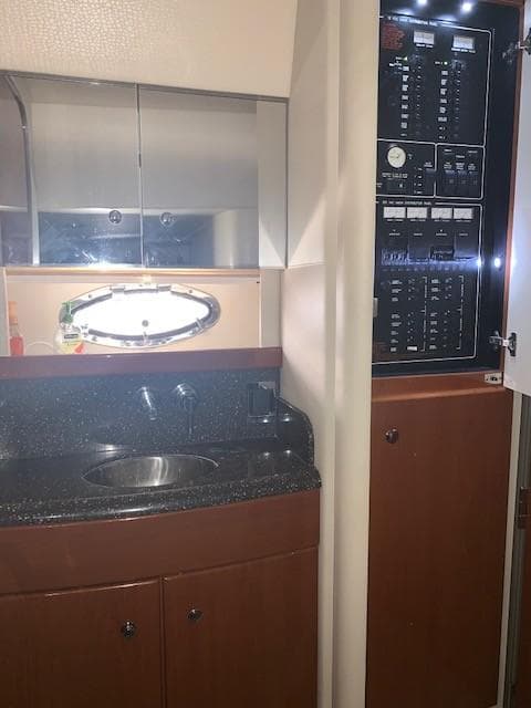 2009 Formula 45 Yacht interior with sink and control panel.