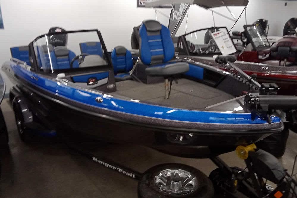 2026 Ranger 1880MS A Pack Equipped boat, blue and black, displayed indoors.