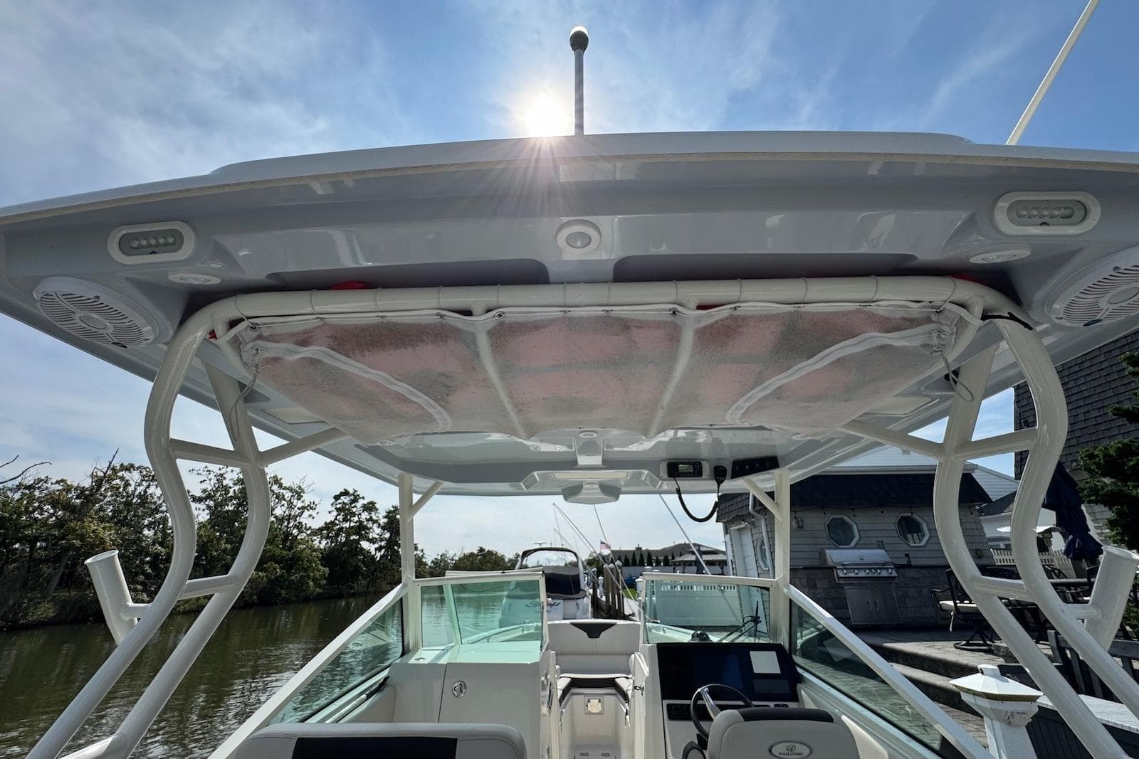 2022 Sailfish 276 DC boat with sunroof and modern cockpit design.