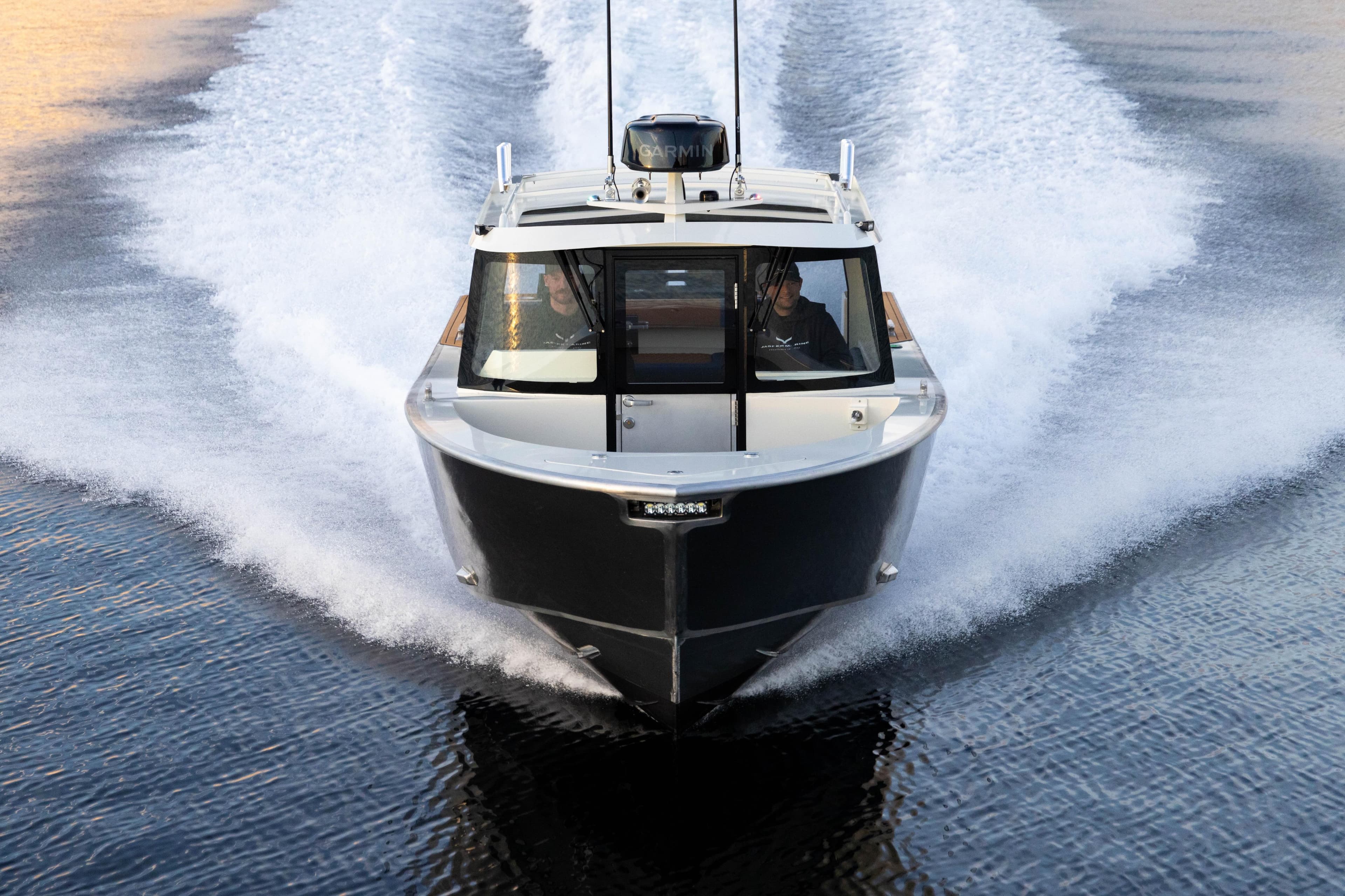2026 Jasper Marine Defender 22 cruising swiftly on open water.