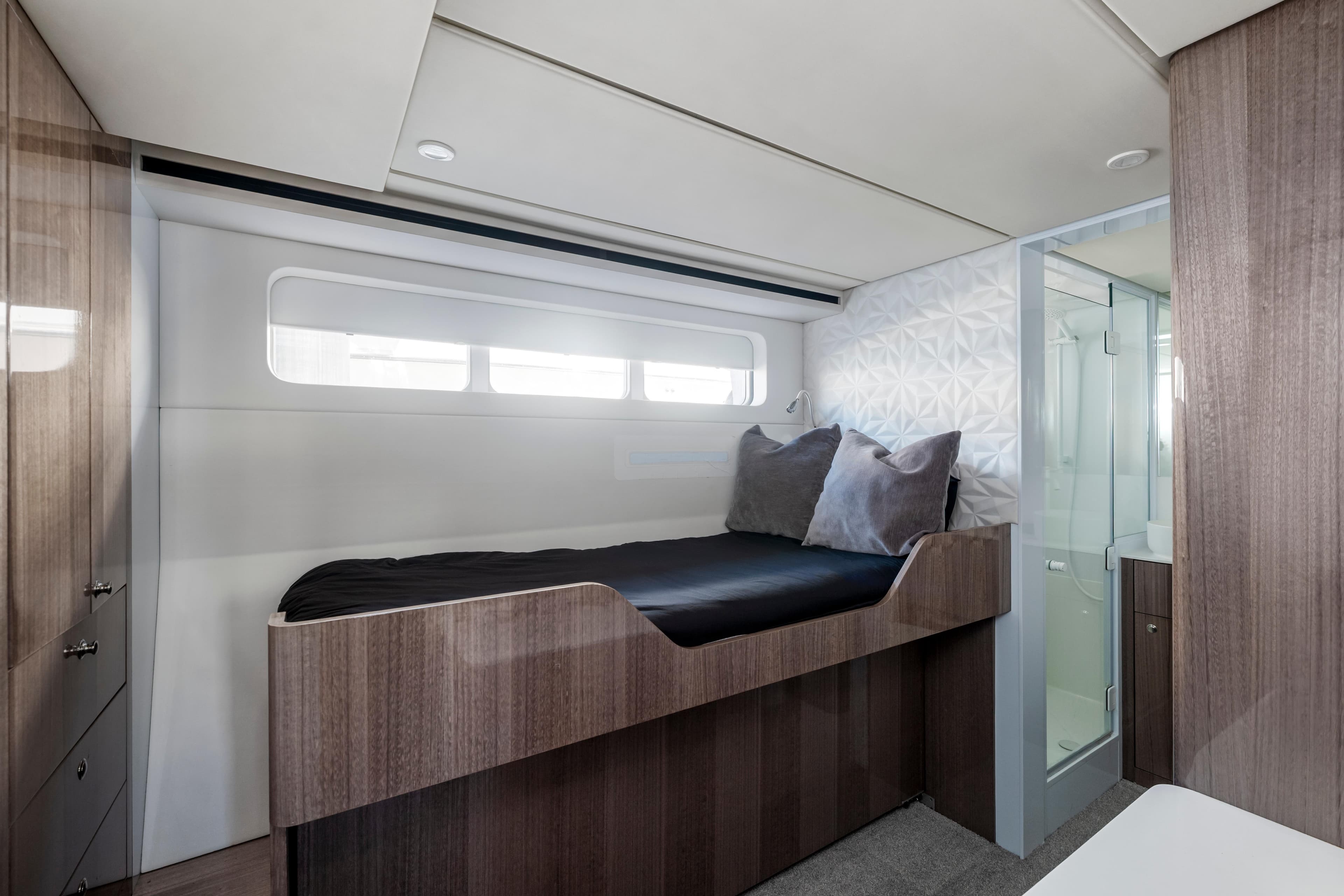Luxurious cabin interior of 2022 Deo Juvante Ocean Passagemaker yacht with modern design.