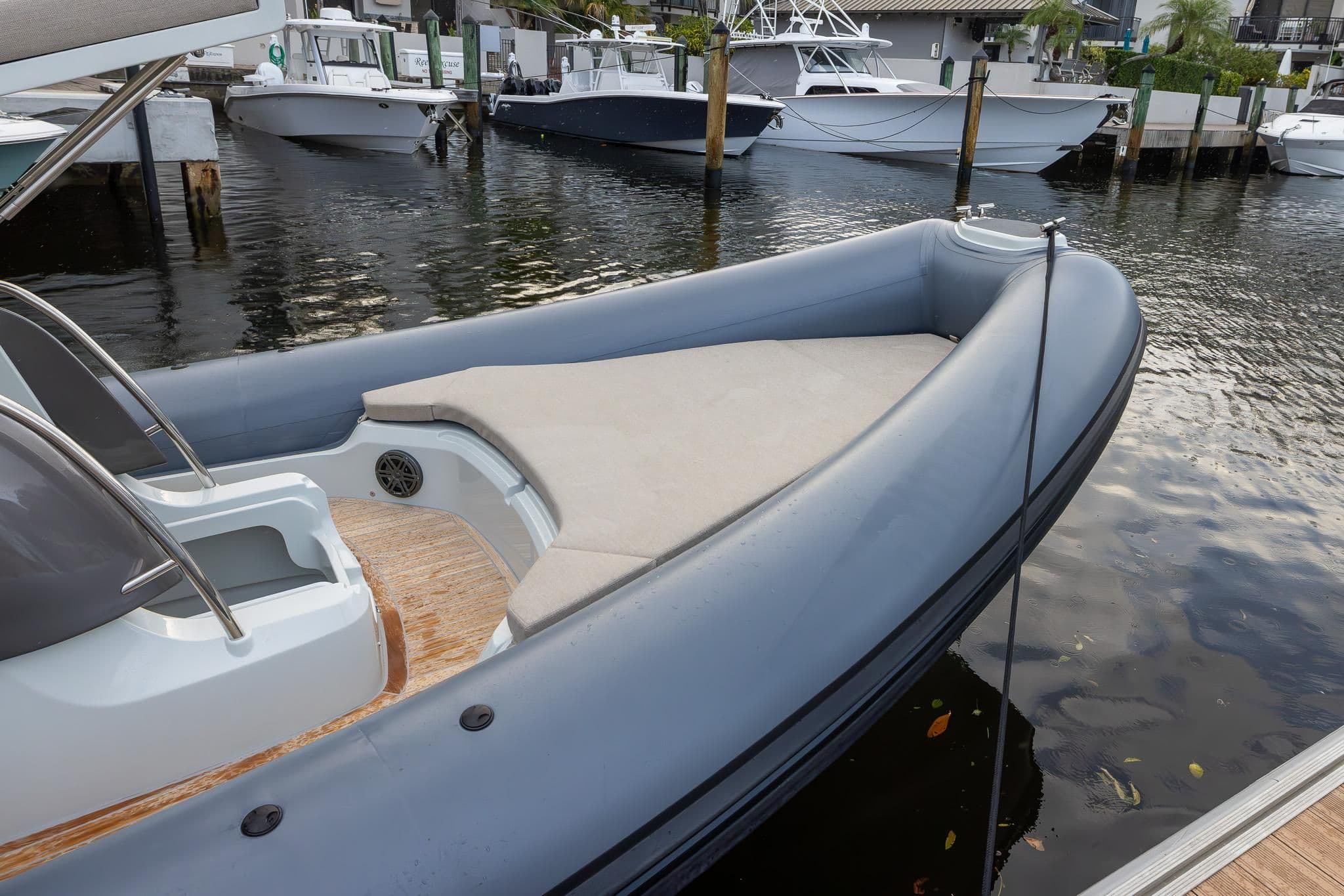 2024 SACS Strider 900 boat docked, modern design.
