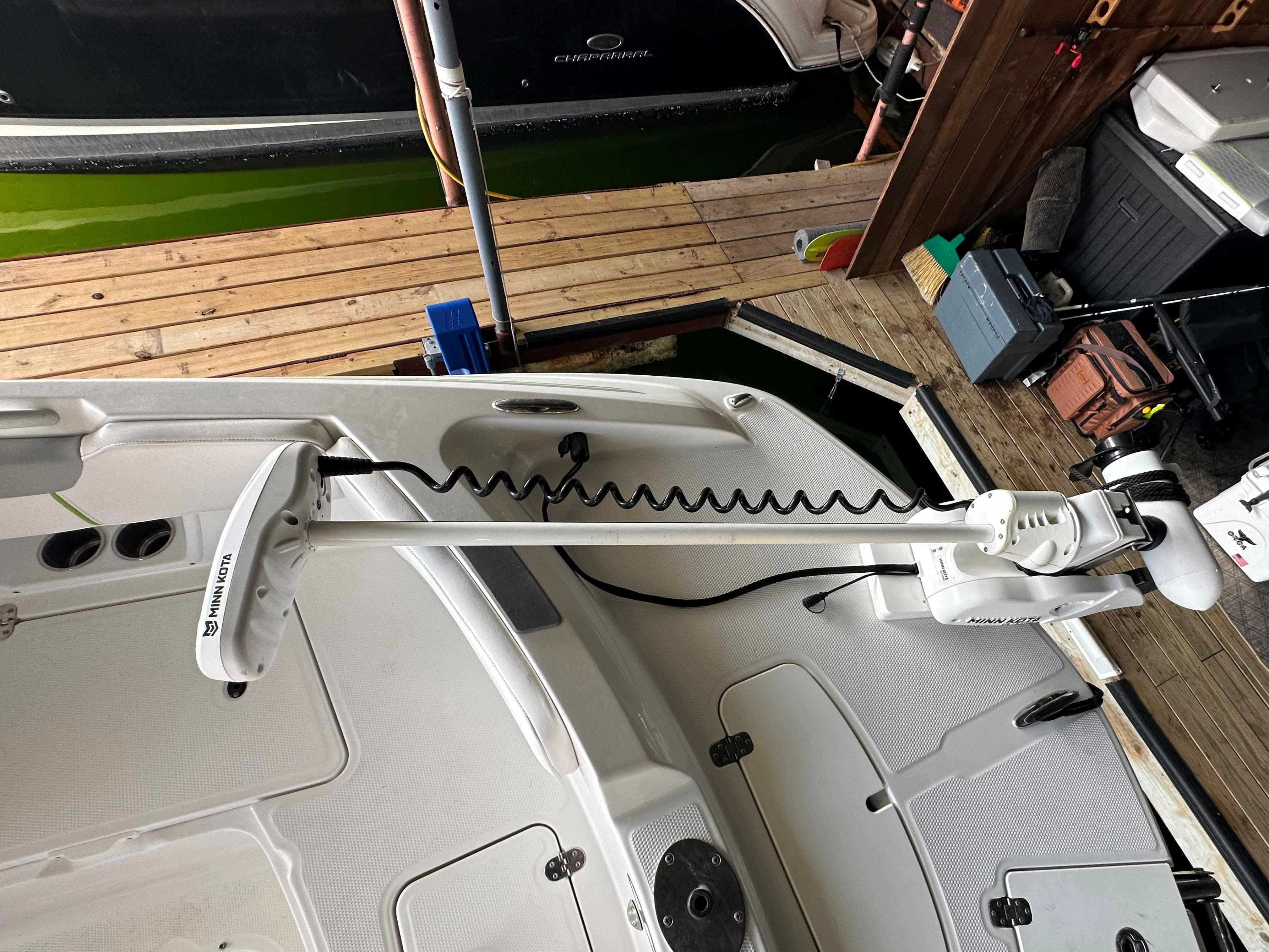 2022 Tahoe 2150 CC boat with Minn Kota trolling motor at dock.