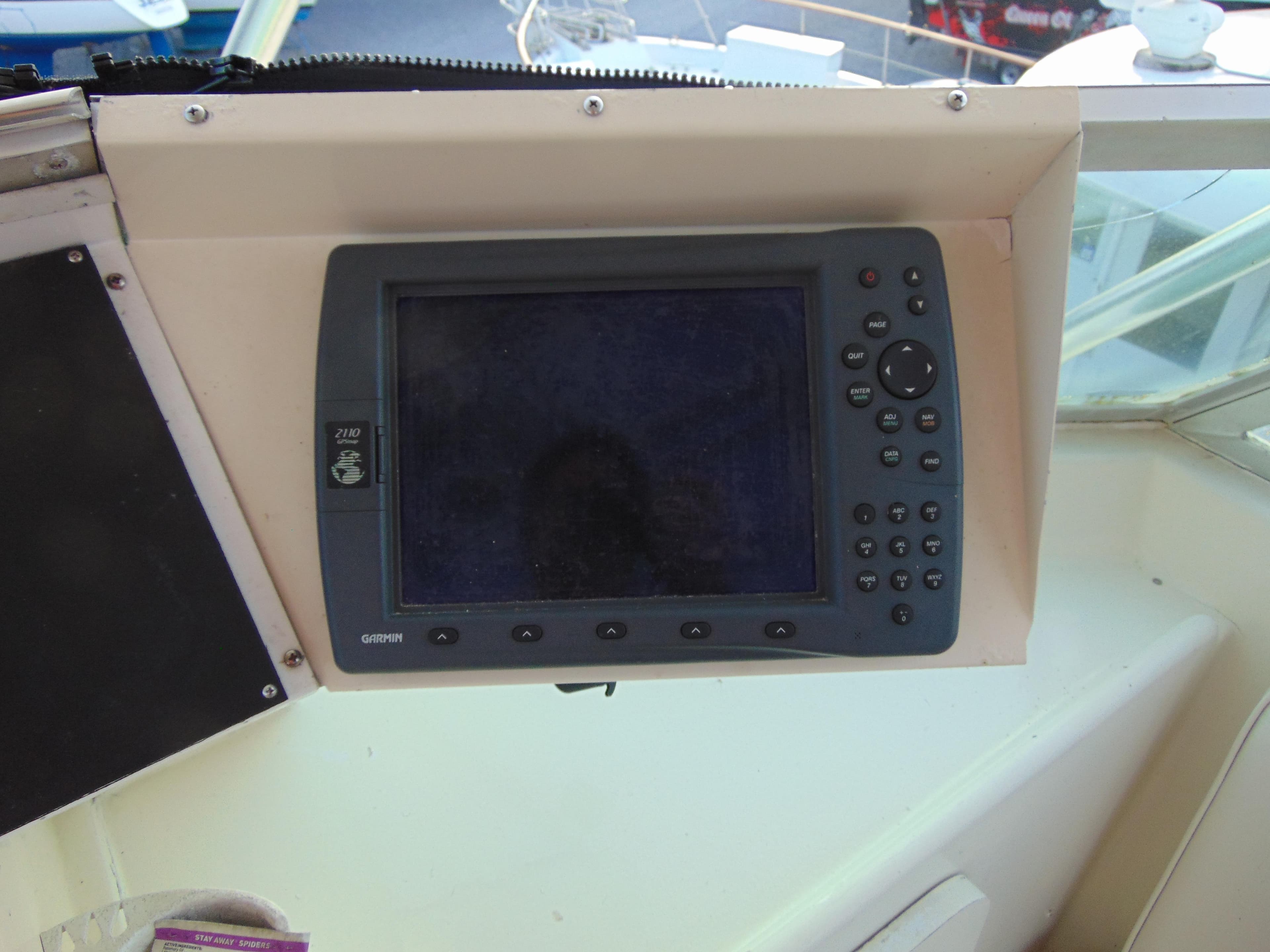 1972 Hatteras Yachtfish navigation system with Garmin GPS display.