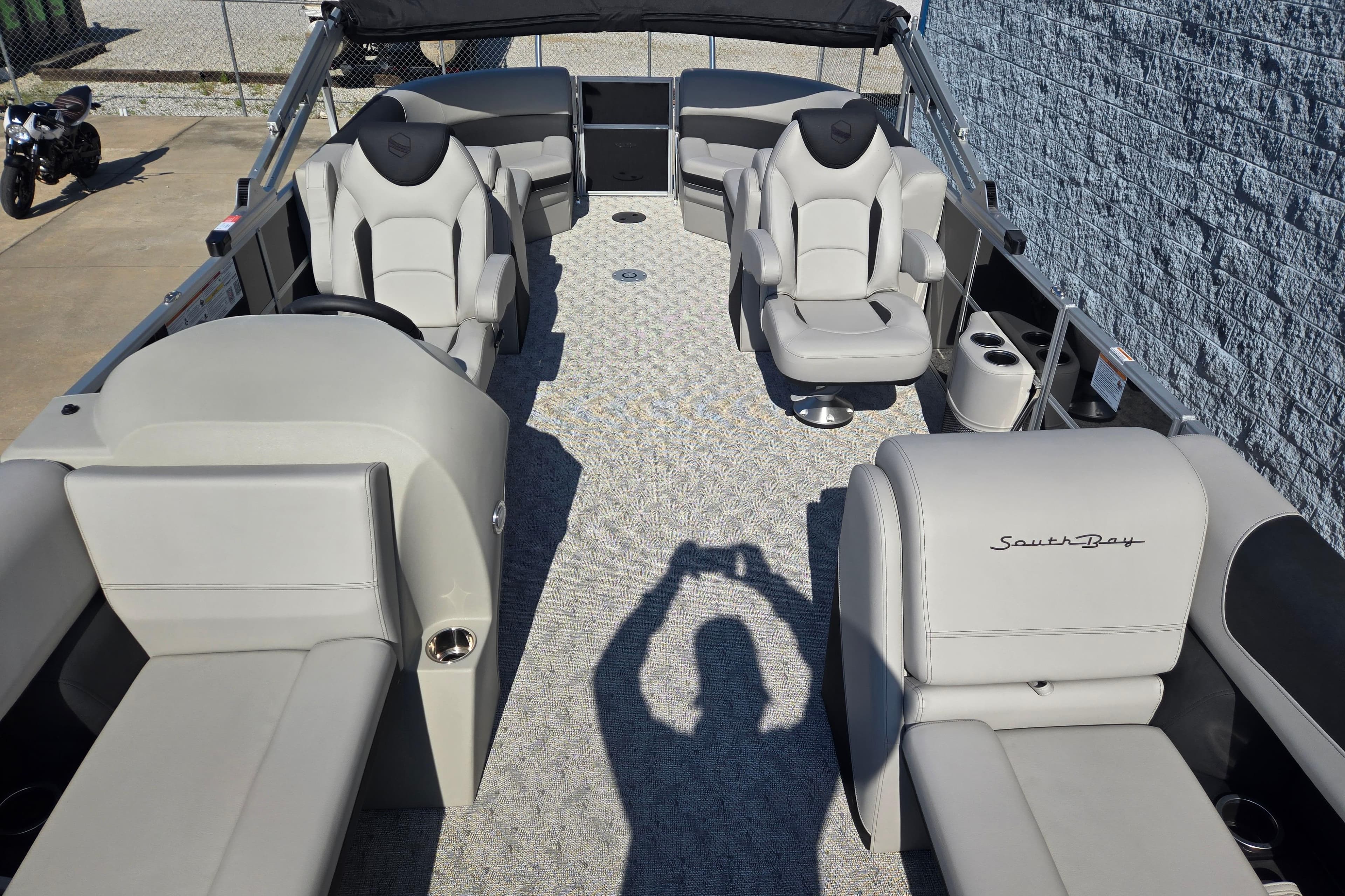 2025 South Bay 224RS LE pontoon boat interior with luxurious seating and modern design.