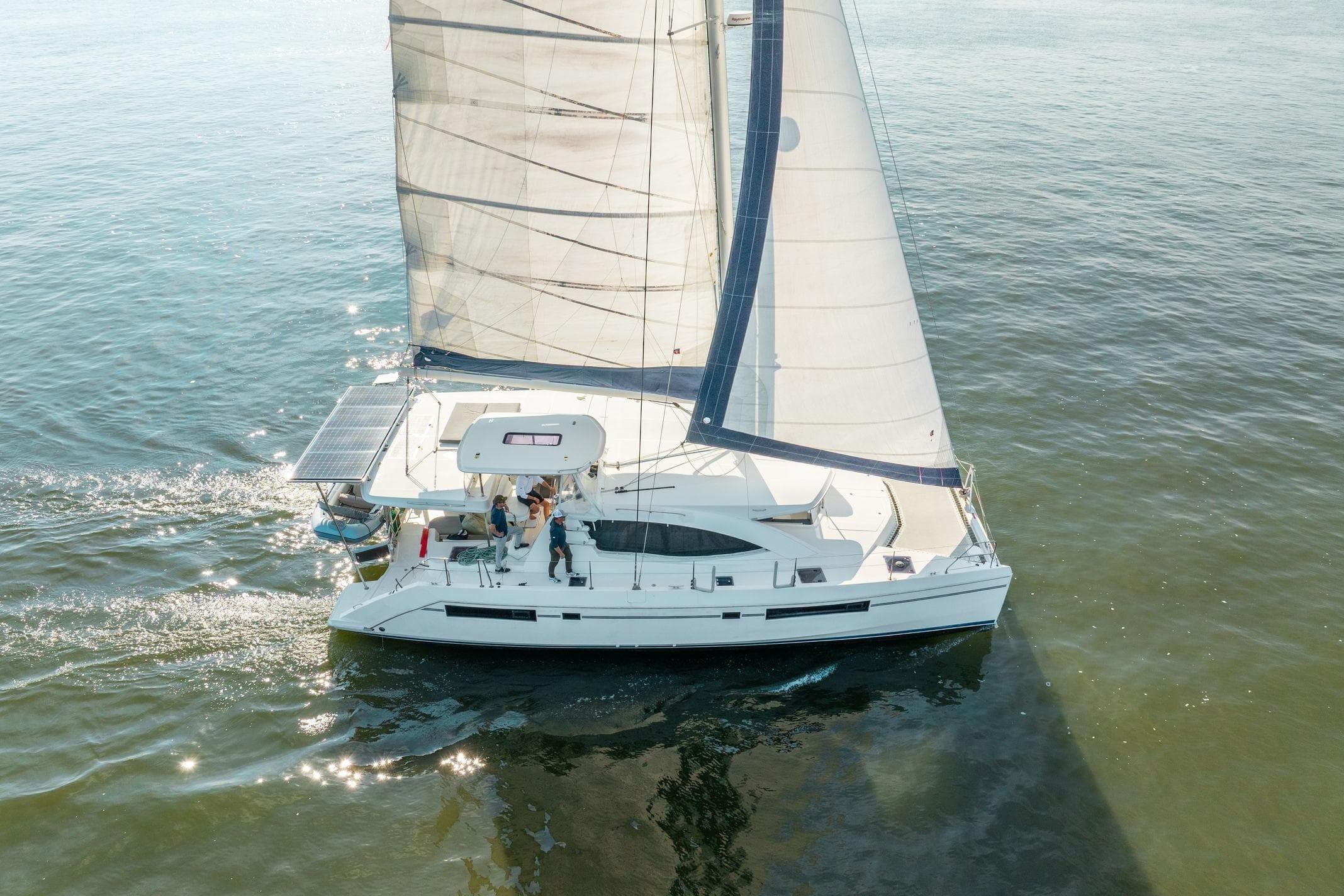 Sailing catamaran Leopard 48, 2016 model, cruising on calm waters.