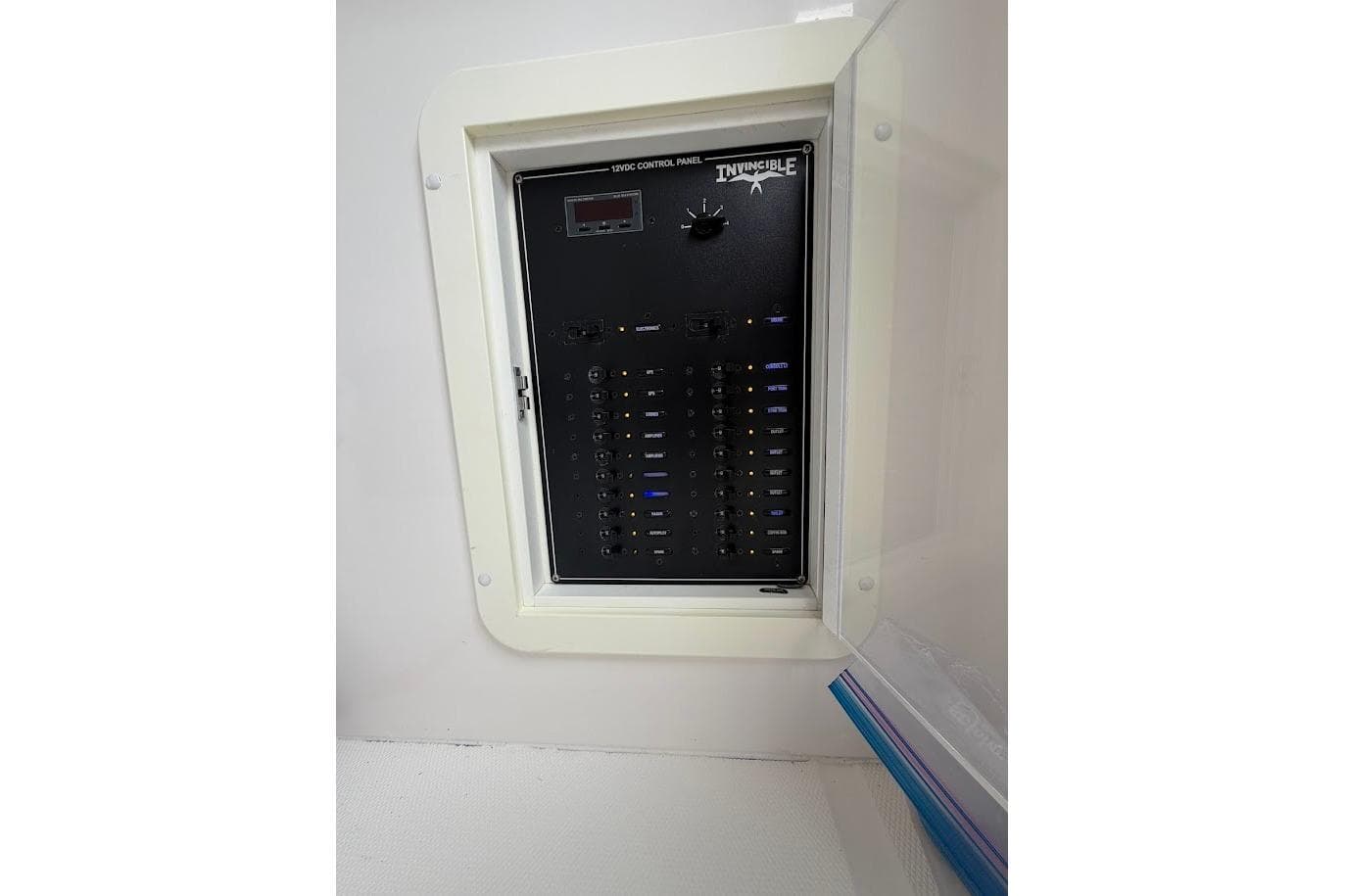 Electrical control panel on a 2019 Invincible 40 Catamaran boat.
