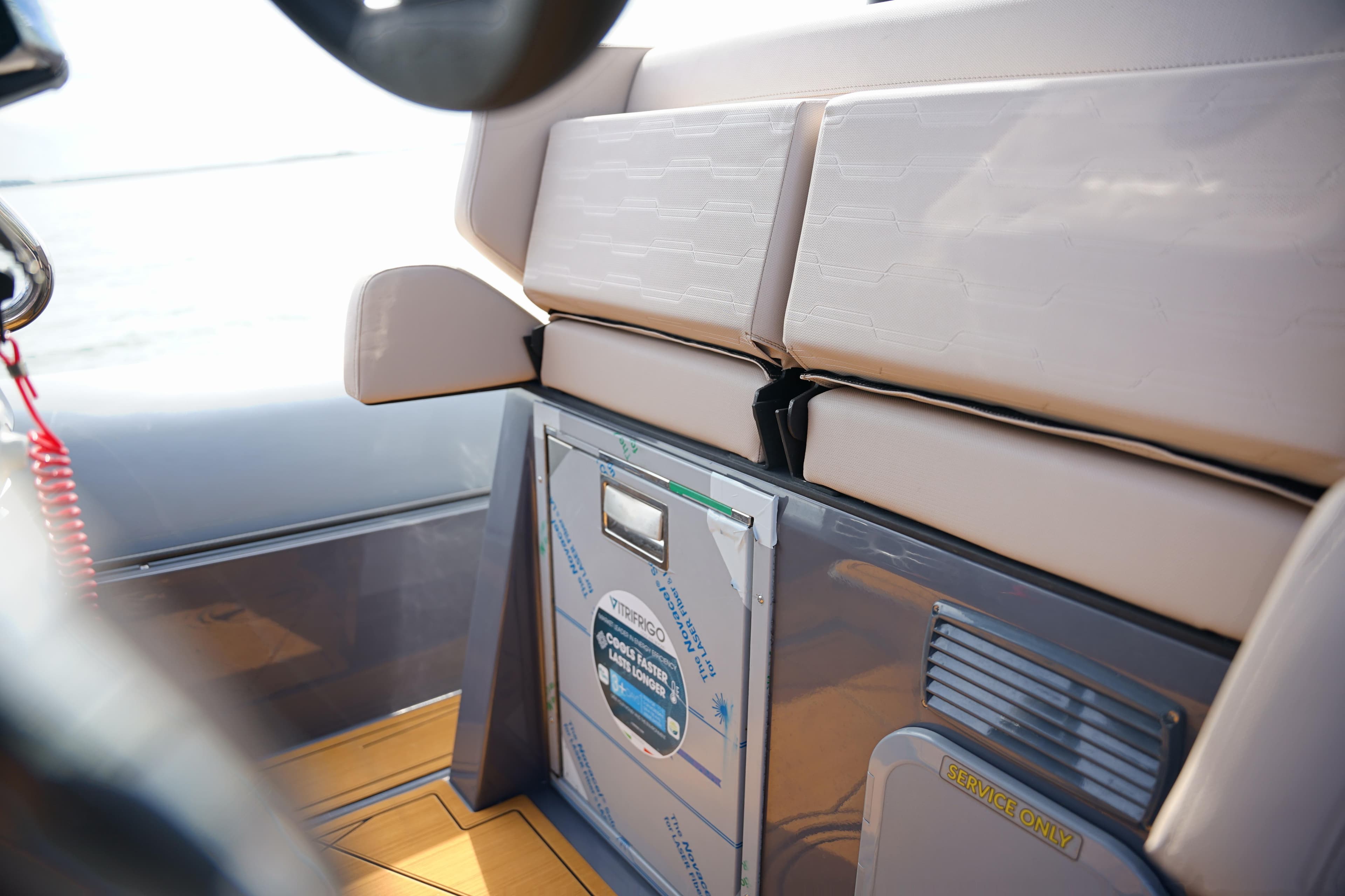 Interior of 2026 Northstar Orion 8 boat, featuring seating and storage area.