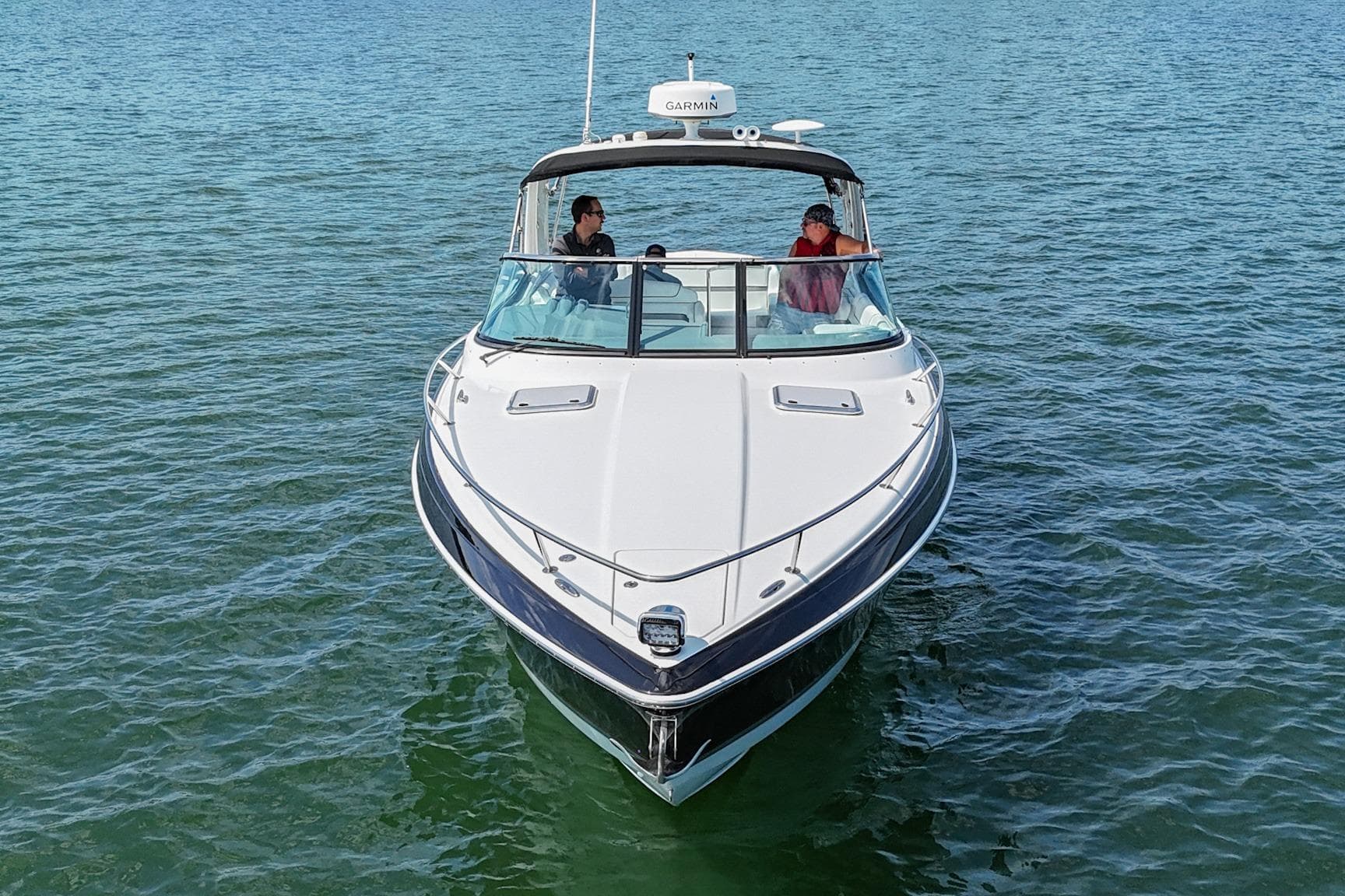 2014 Formula 350 Sun Sport boat cruising on open water.