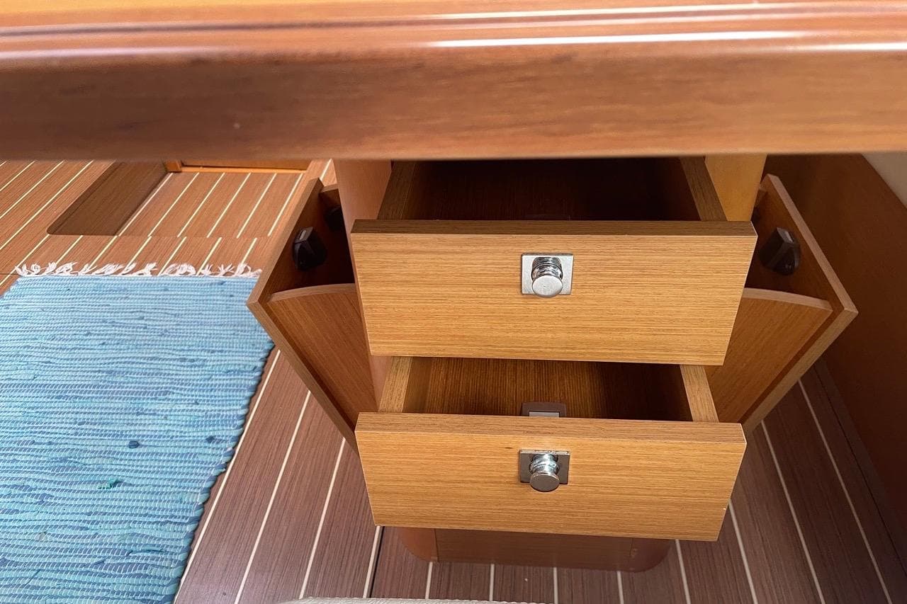 Wooden drawers in Jeanneau Sun Odyssey 50 DS yacht interior, 2015 model.