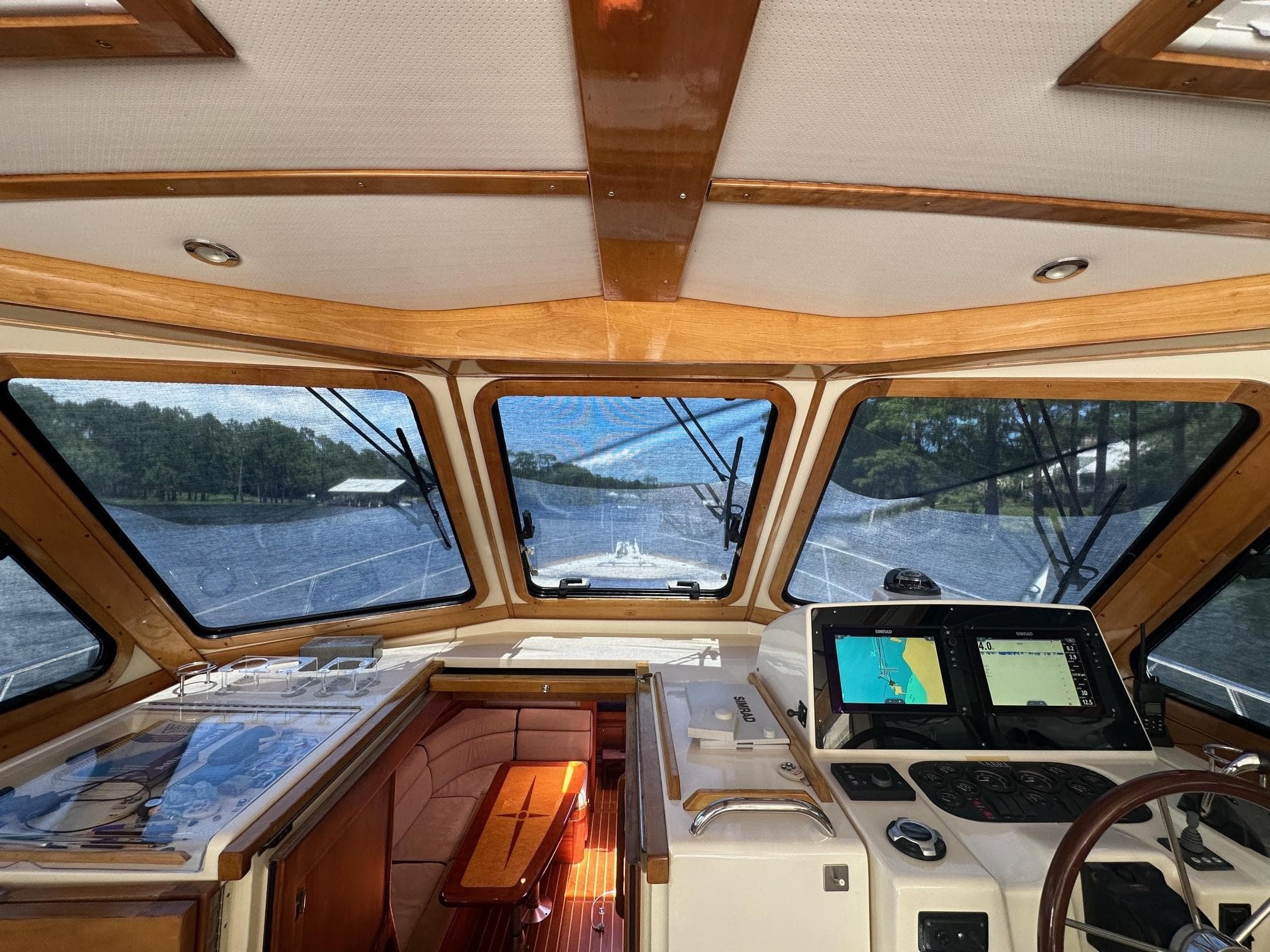 Interior view of 2005 Sabre 42 Express yacht cockpit with navigation screens.