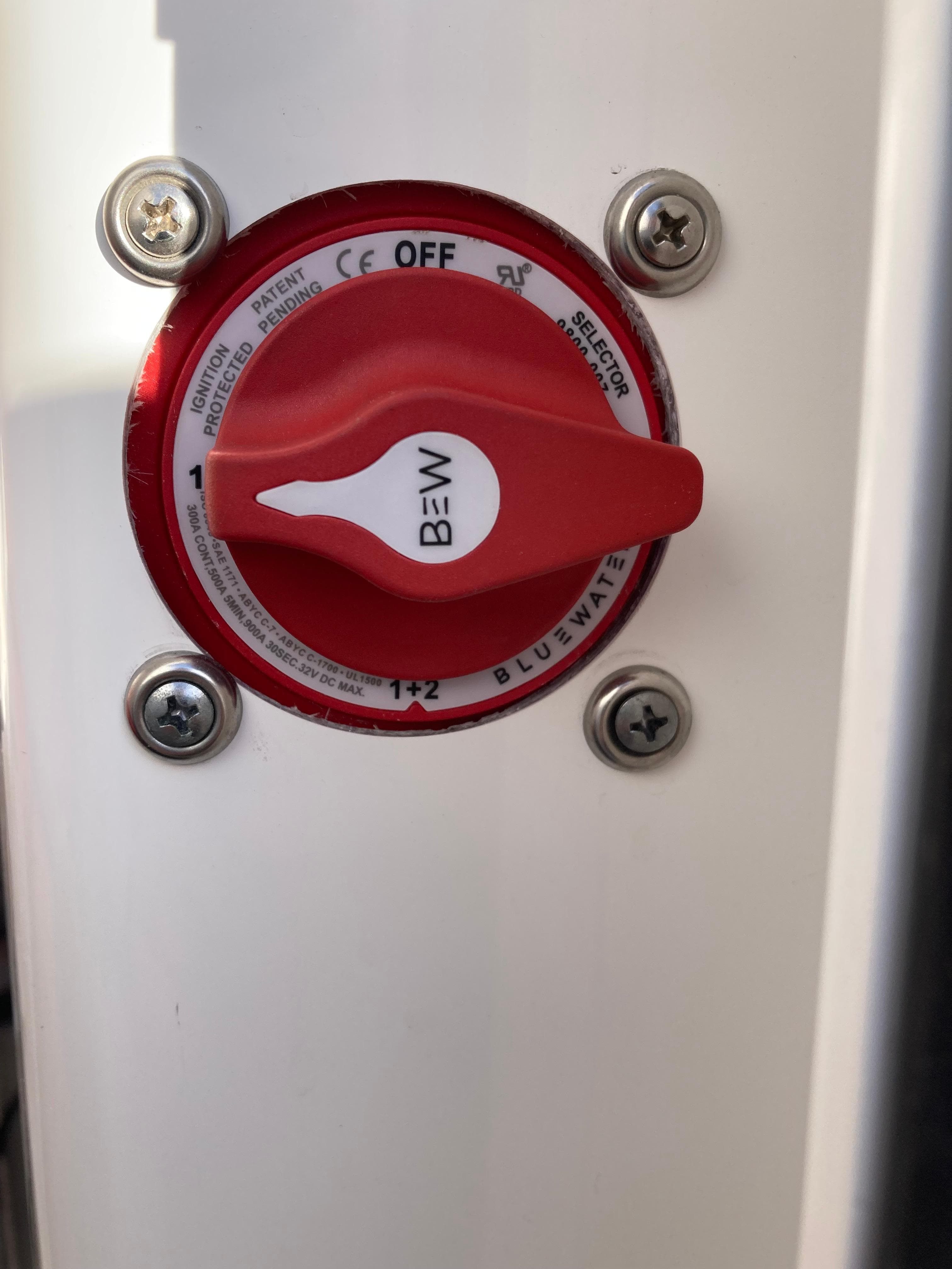 Red battery switch on 2023 Sportsman Open 242 Center Console boat.