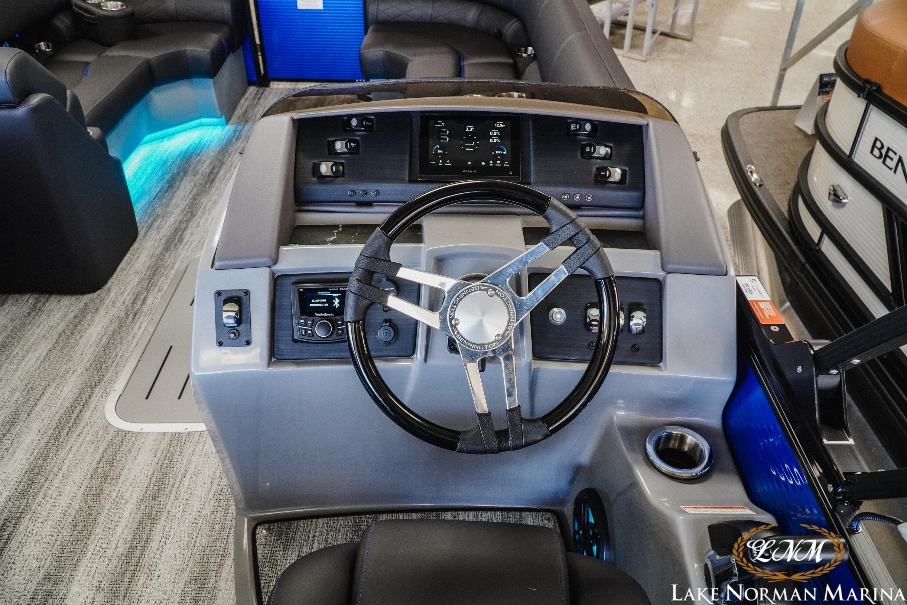 2026 Bennington 23LSB boat interior with modern steering console and seating at Lake Norman Marina.