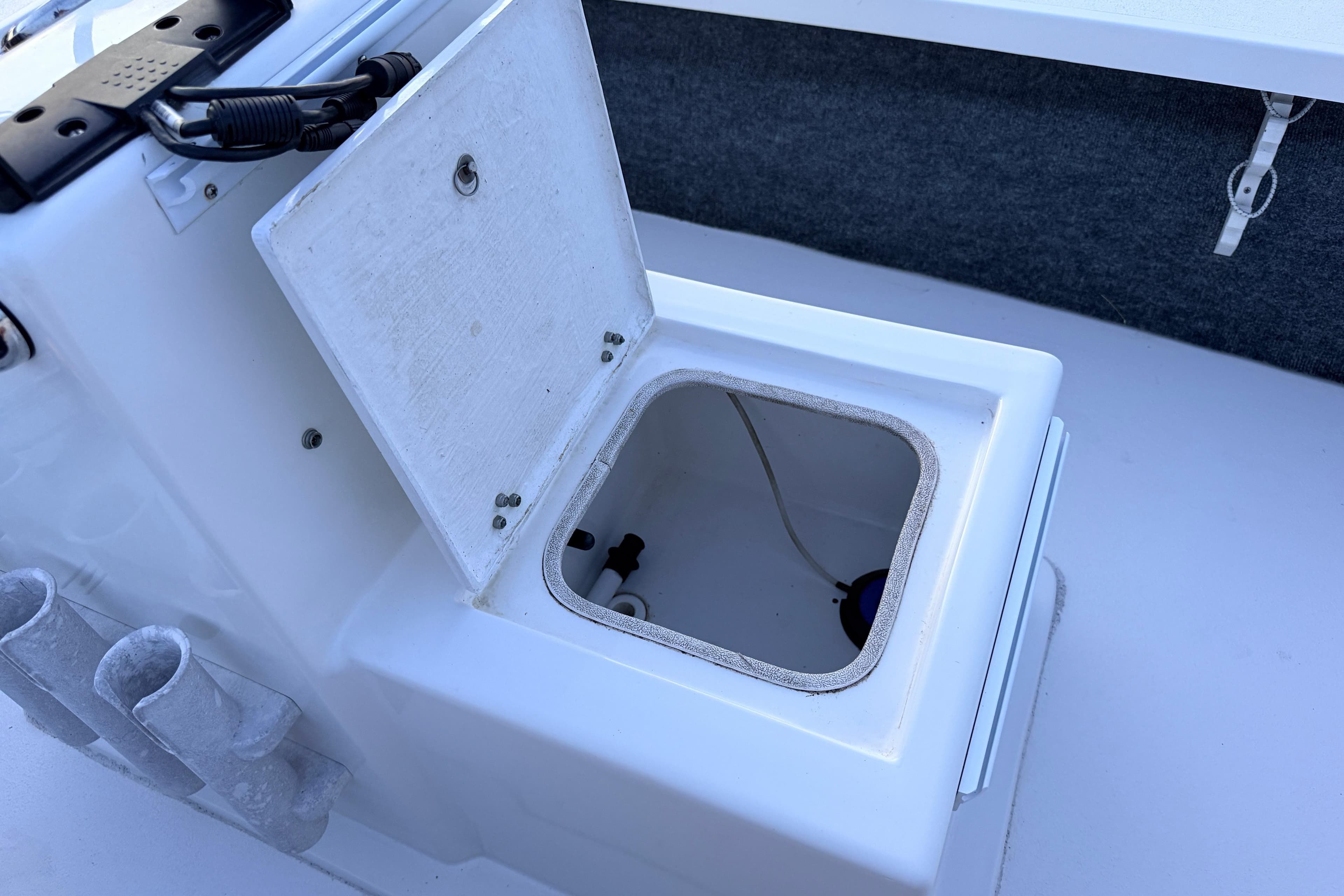 Open storage compartment on a 2019 Mitzi Skiffs 17 boat.