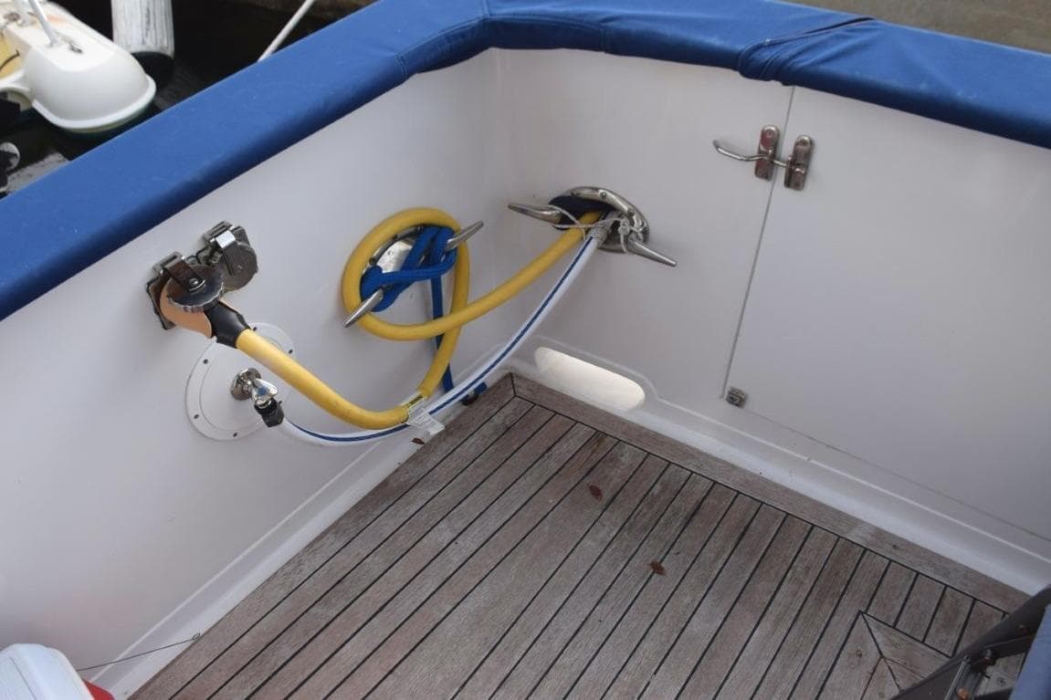 Shore power inlet from aft cockpit as well at either side of bow, dockside water/freshwater washdown spigot