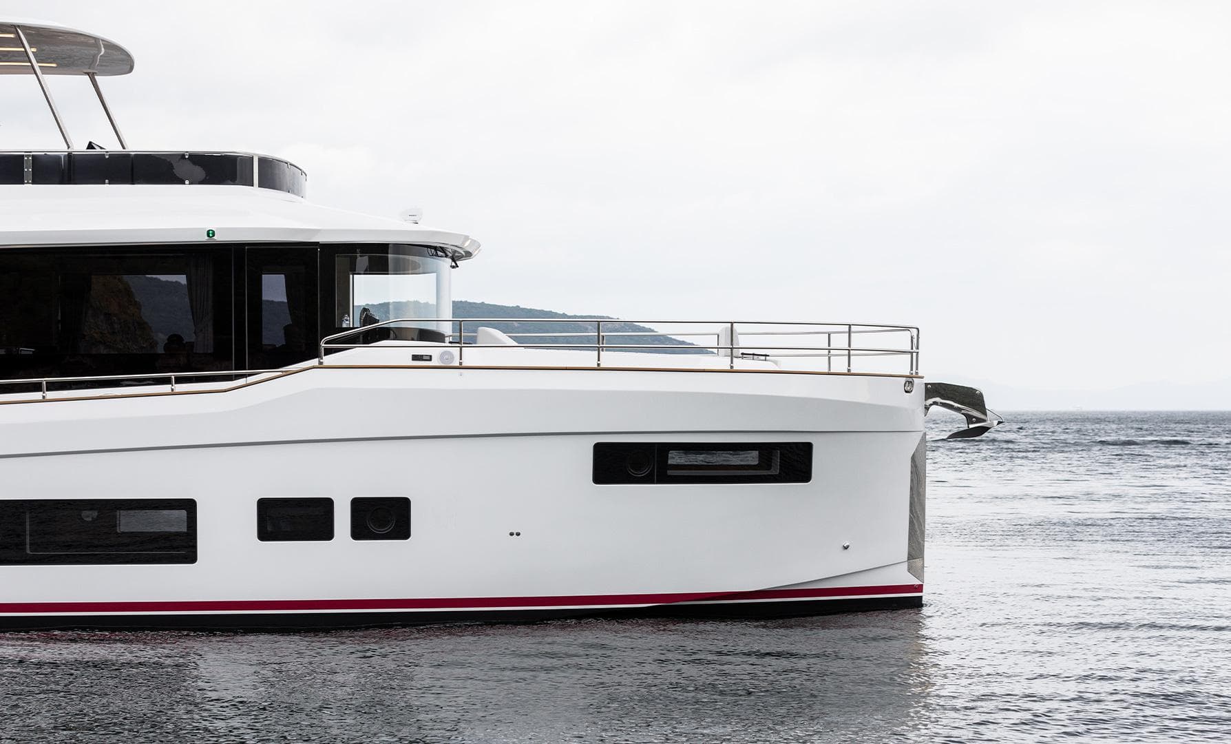 2025 Sirena 48 yacht on calm sea, showcasing sleek design and modern features.