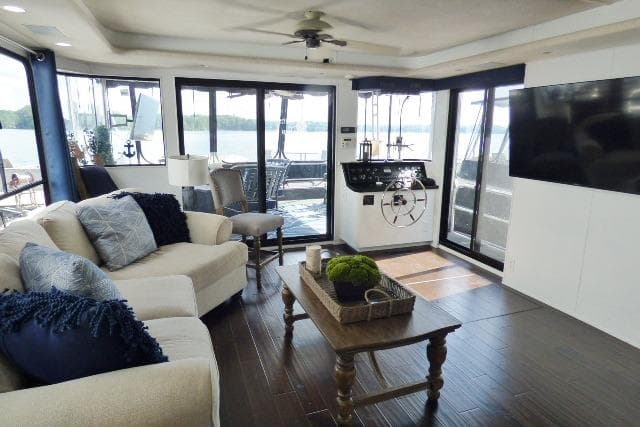 Luxurious 1997 Sumerset 16x80 houseboat interior with modern decor and lake view.