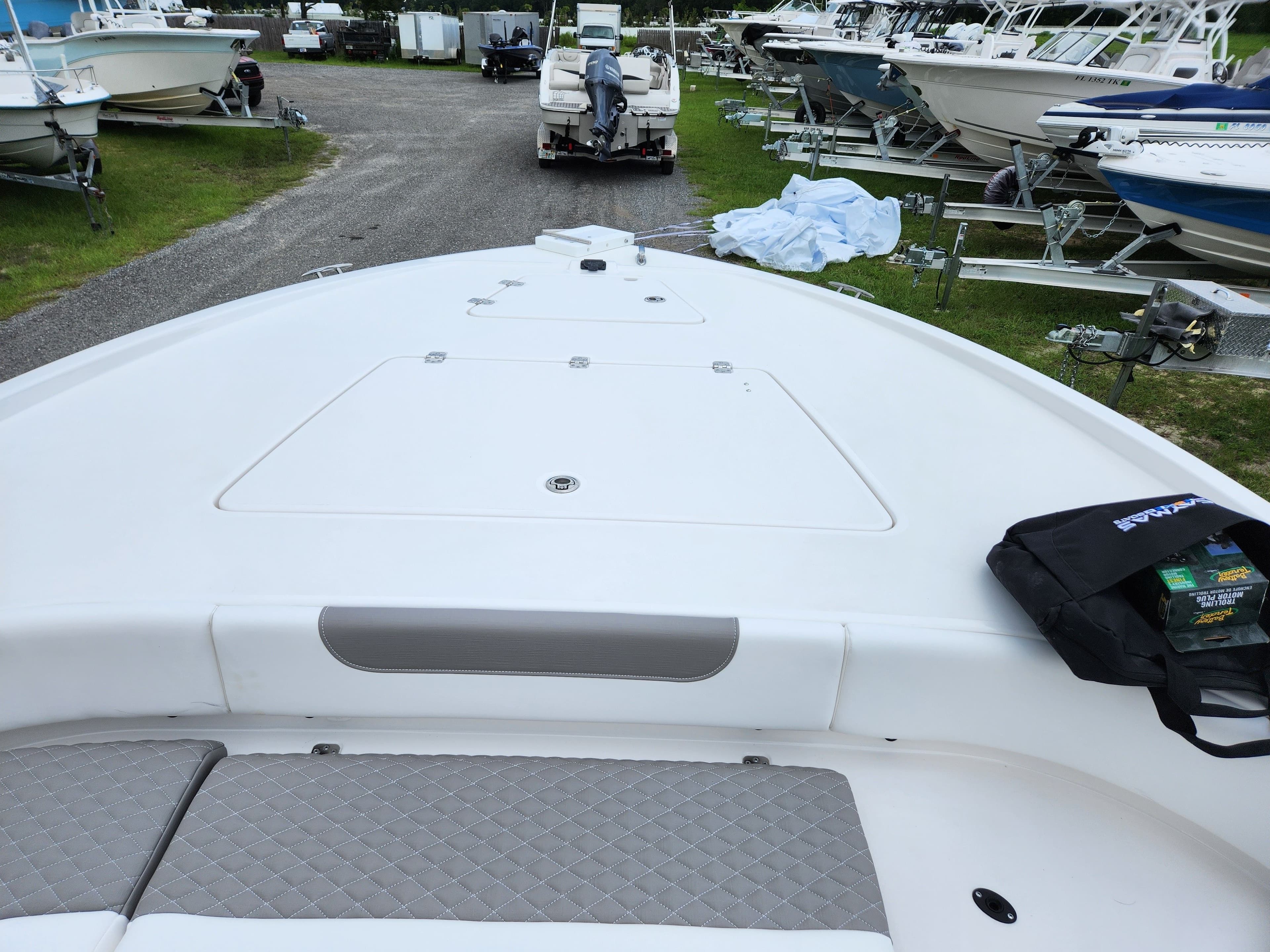 2024 Caymas 28 HB boat parked at a boatyard.