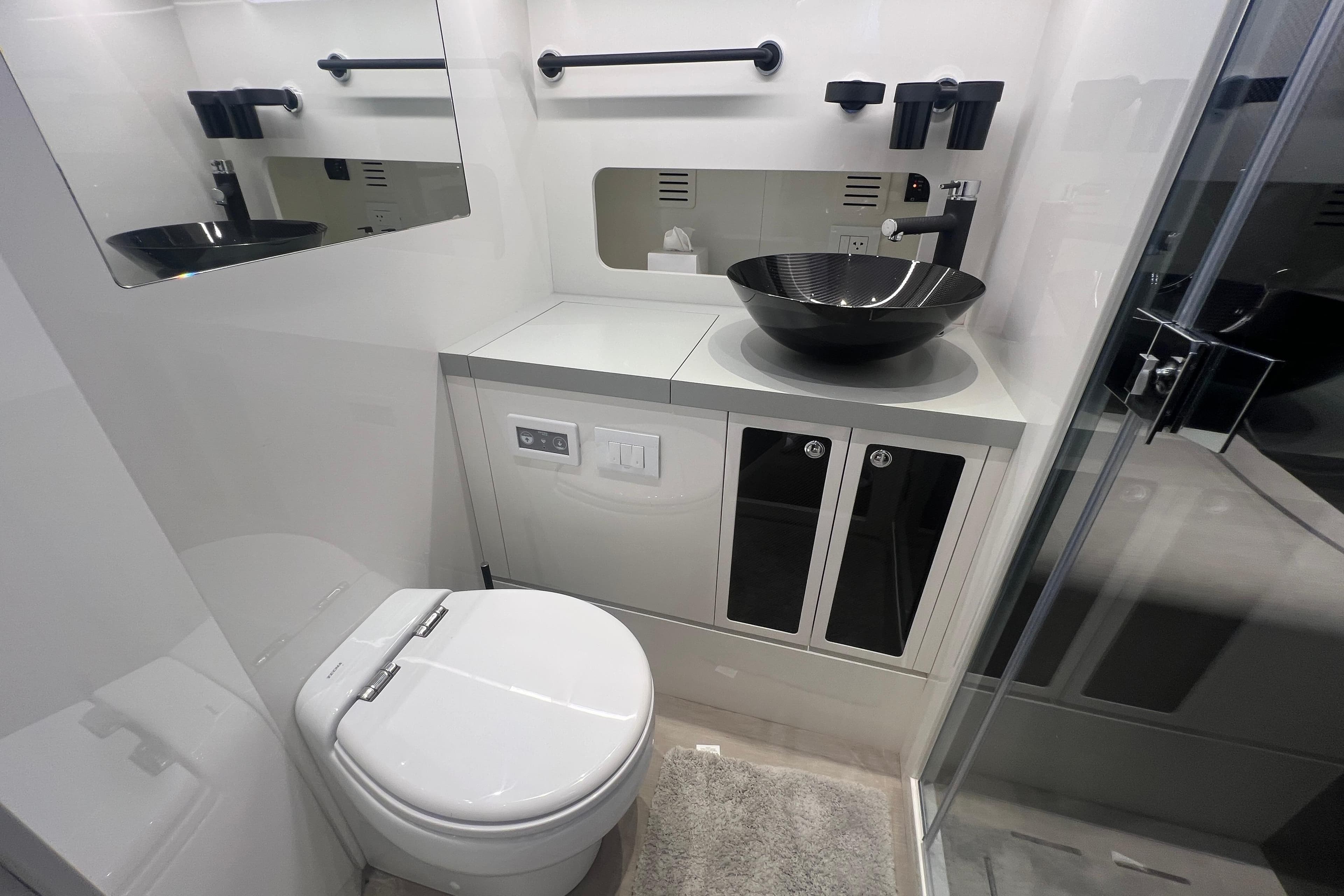 Modern bathroom in 2023 Canados 493 Gladiator yacht with sleek fixtures and elegant design.