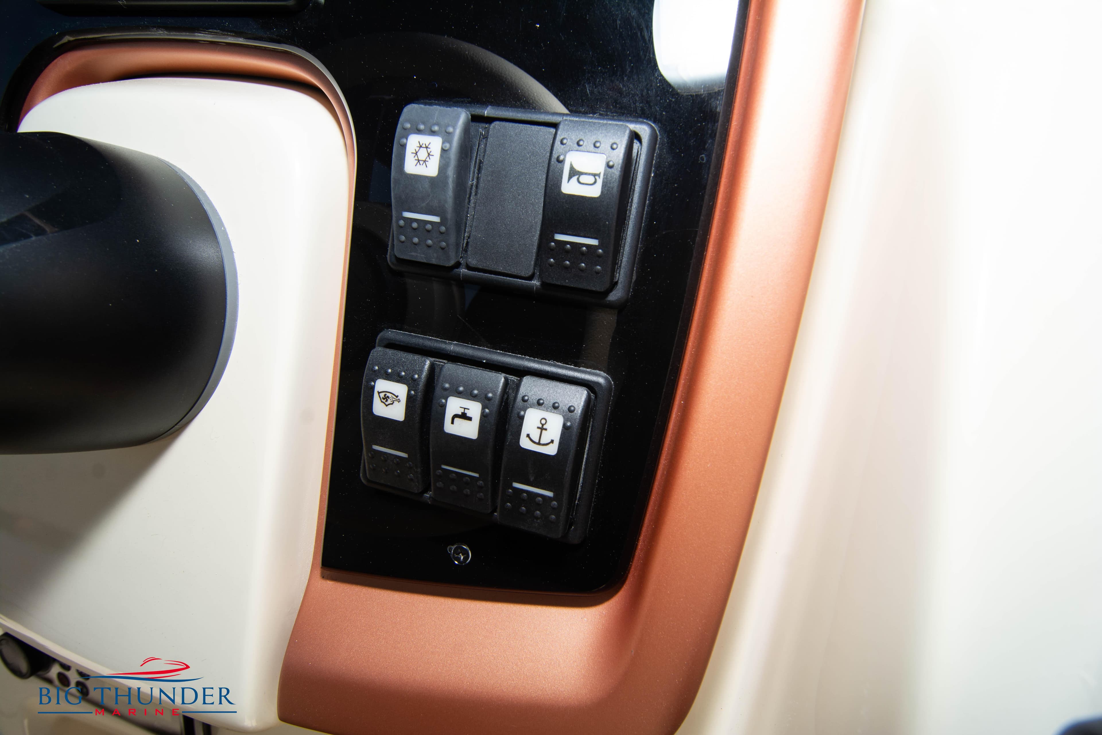 Control panel of 2024 Capoforte FX270 boat with various function switches.