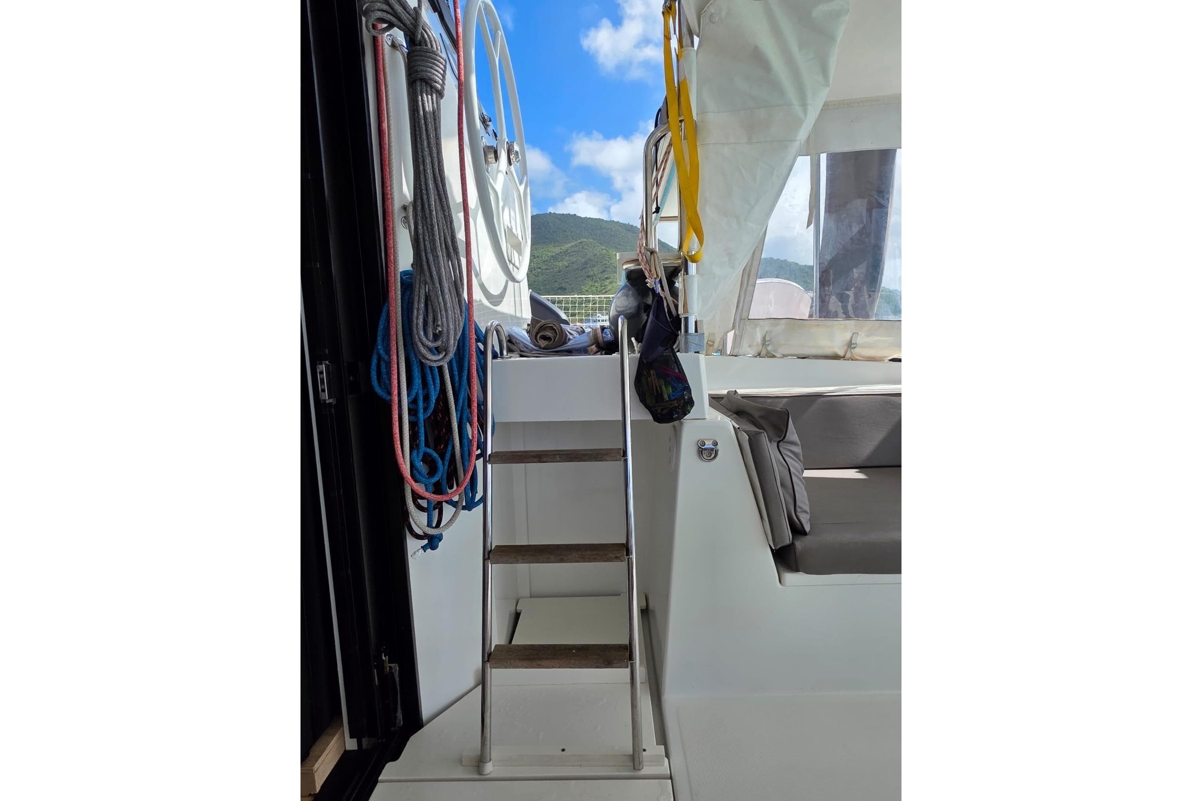Interior view of a 2016 Bali 4.5 catamaran with ropes and seating area.