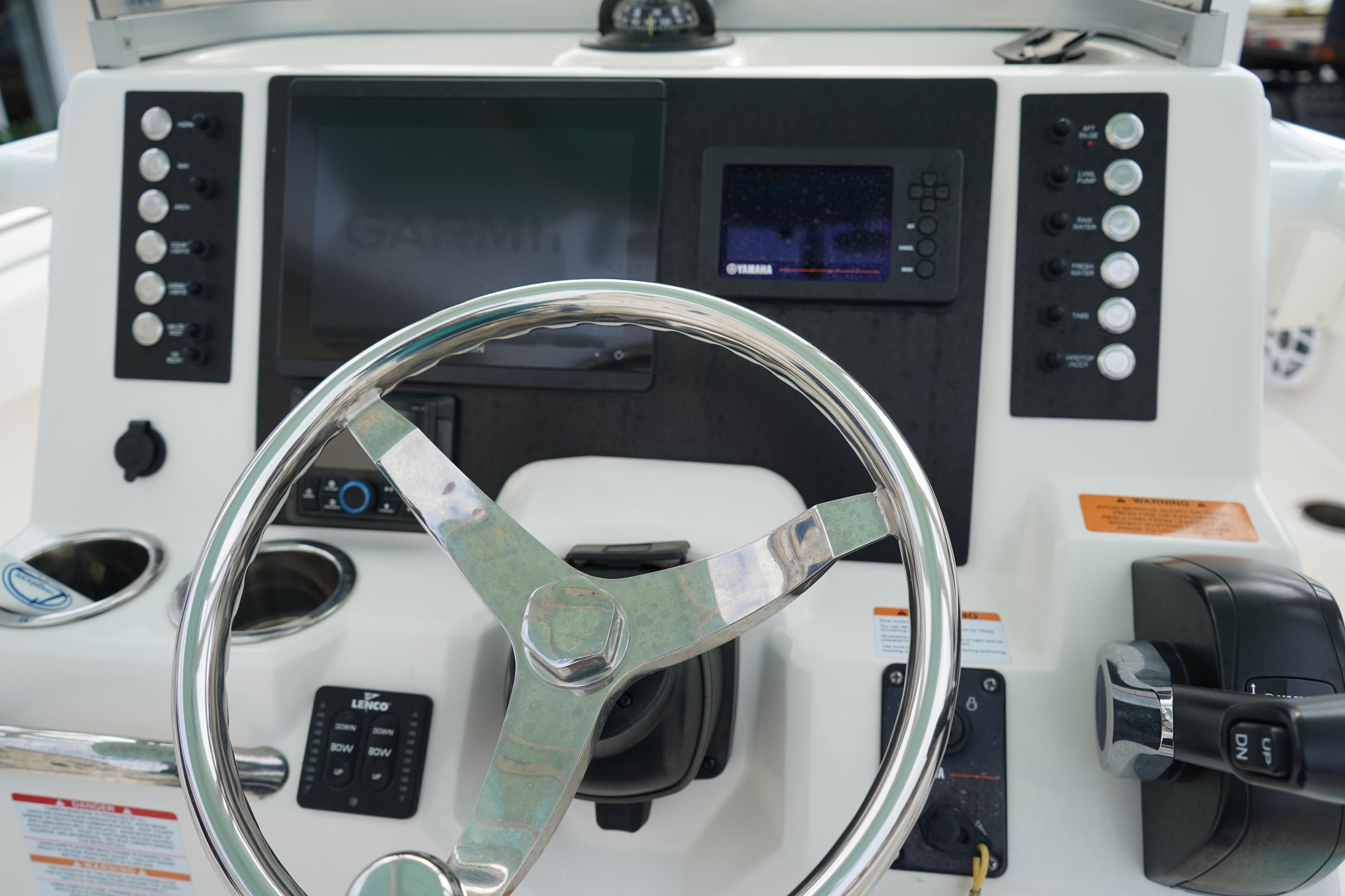 2023 Robalo R222 Center Console dashboard with steering wheel and navigation controls.