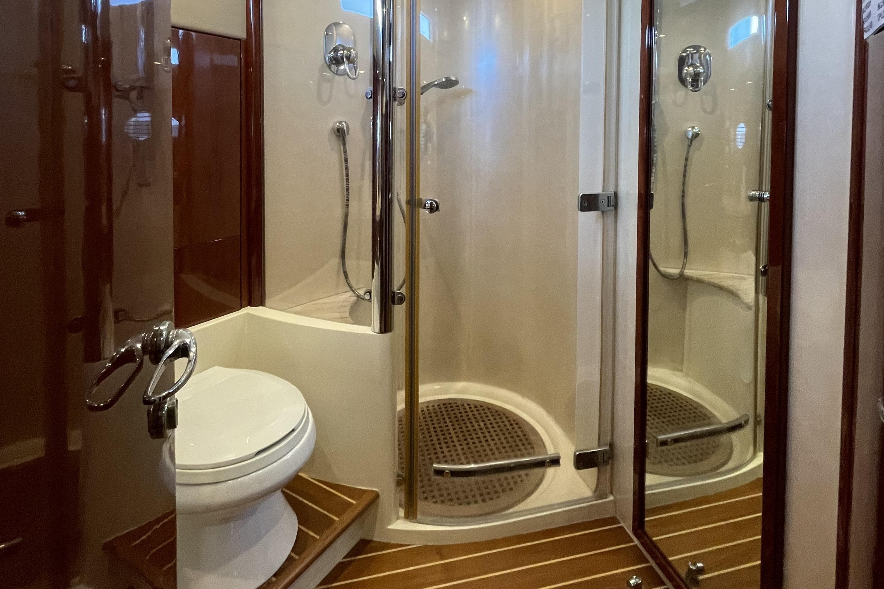 Luxurious bathroom on 2001 Fairline Squadron 58 yacht with shower and toilet.
