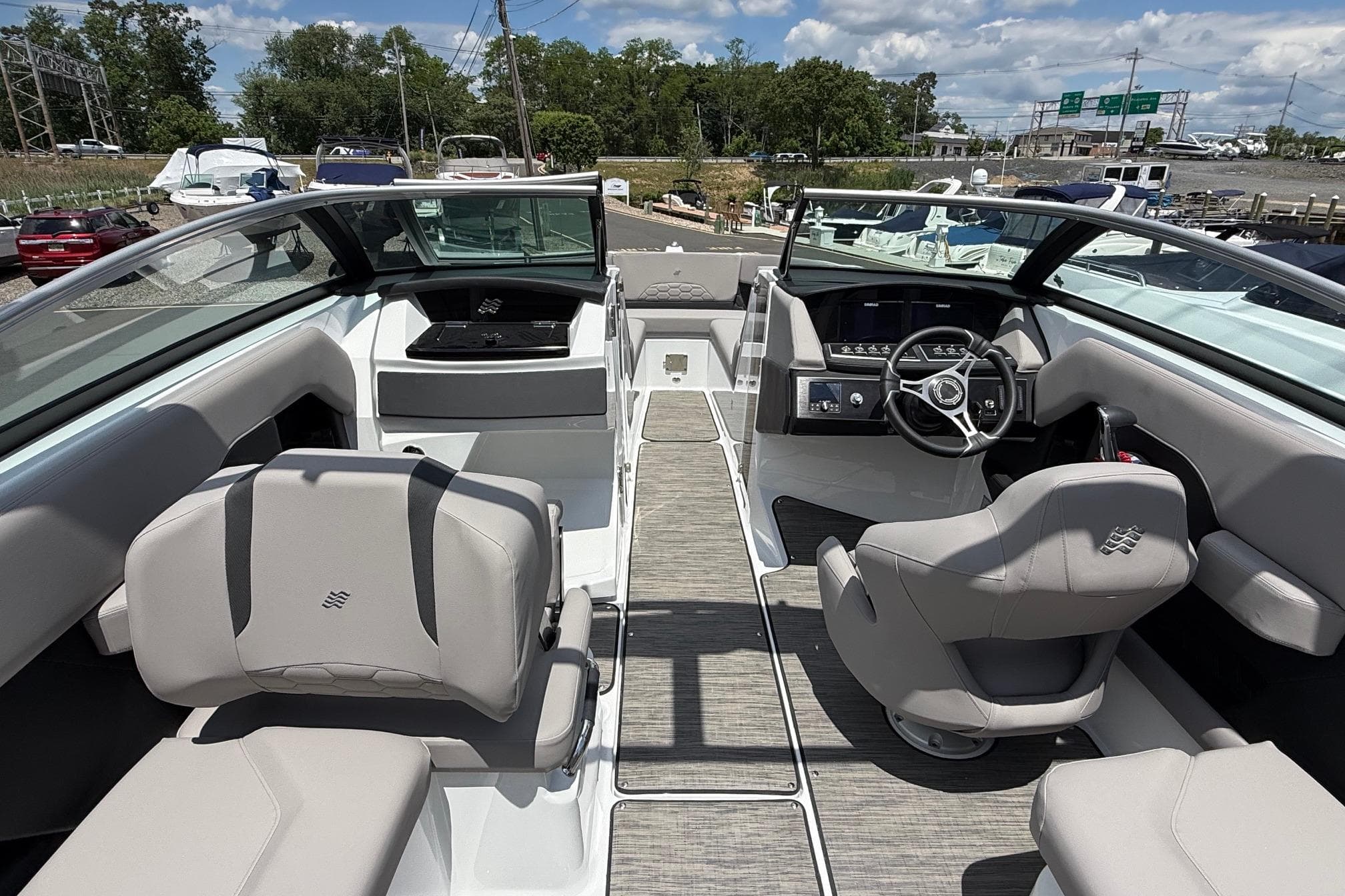 Interior of 2026 Four Winns H6 OB with modern seating and controls.