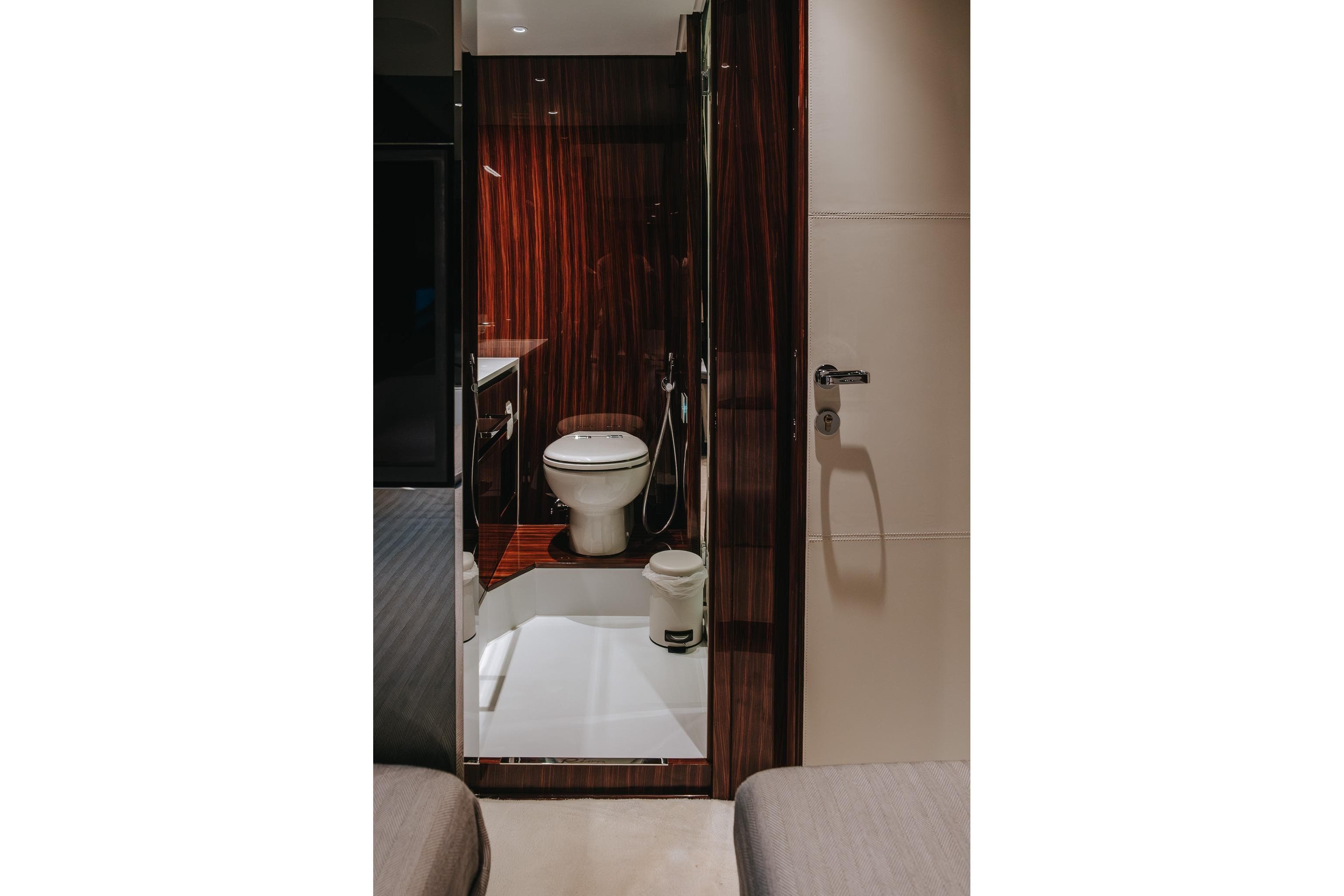 Luxurious bathroom interior on 2022 Riva 82' Diva yacht, featuring modern design elements.