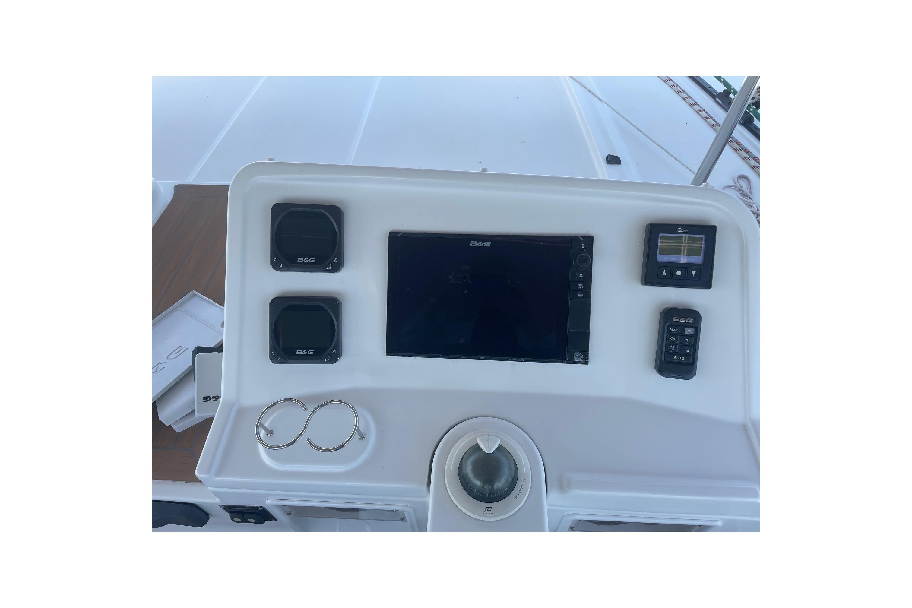 Control panel of a 2016 Lagoon 450 F catamaran with navigation instruments.