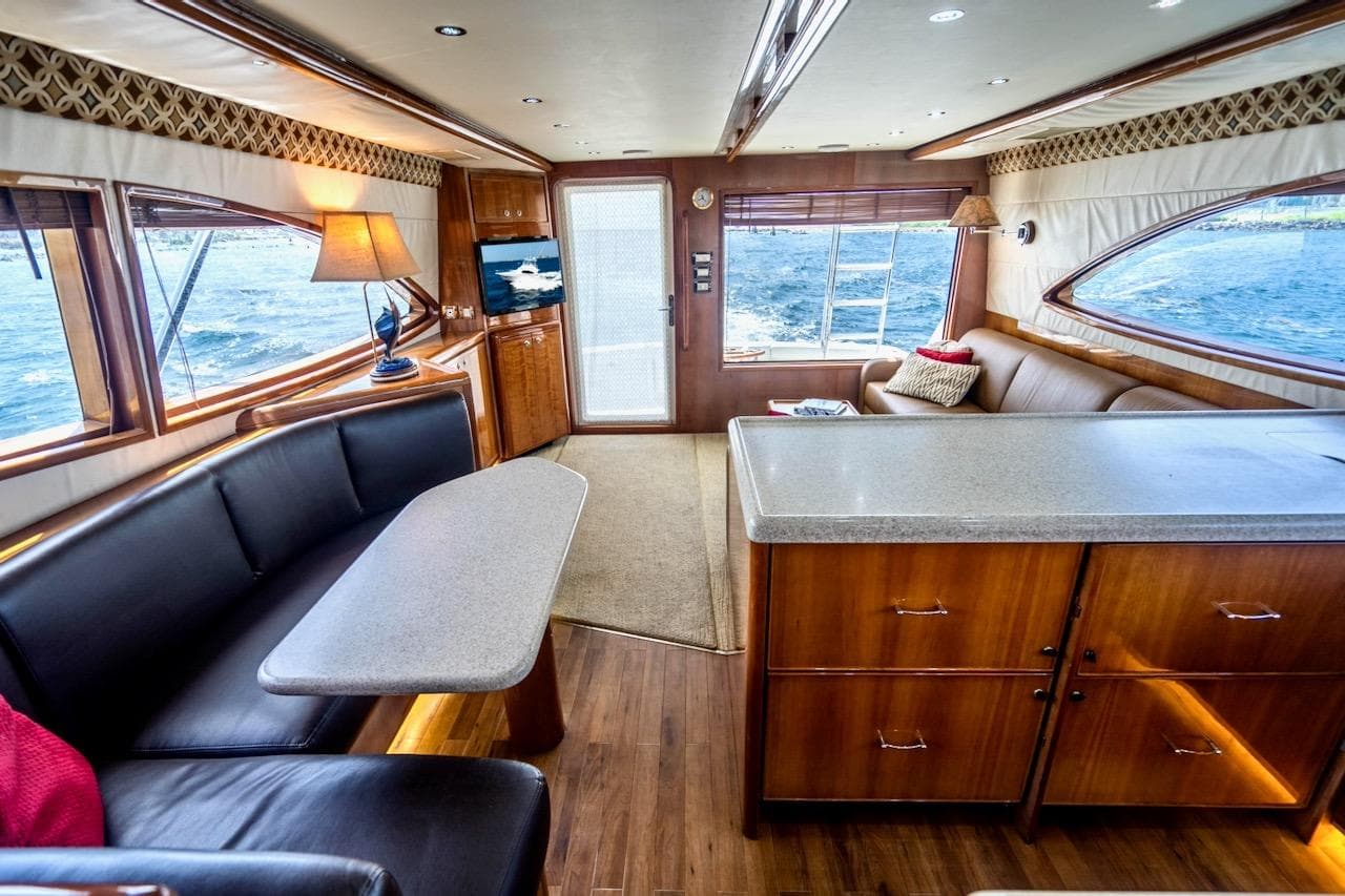 Luxurious interior of a 2001 Bertram 510 Convertible yacht with elegant furnishings.