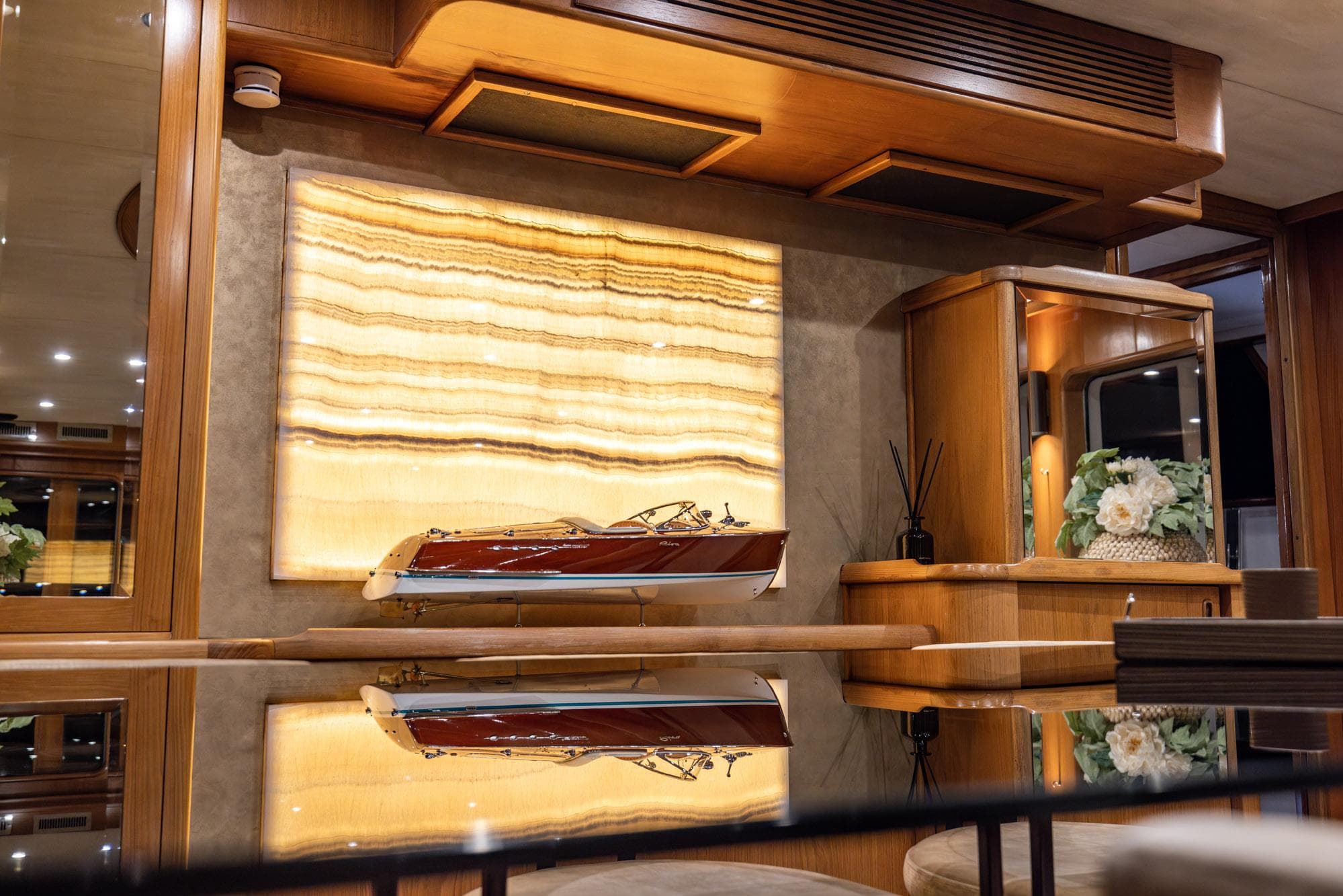Luxurious interior of 1963 Feadship Classic Canoe Stern yacht with elegant wood finishes.