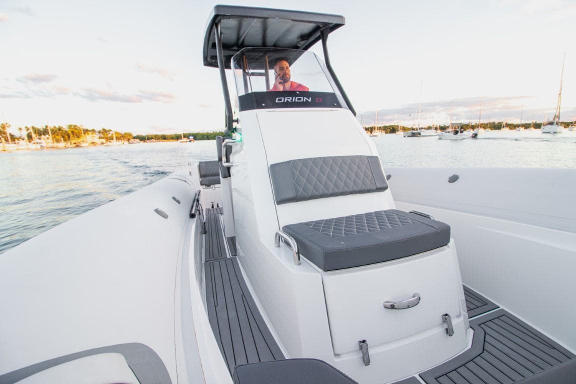 2024 Northstar Orion 8 boat on water, featuring sleek design and comfortable seating.