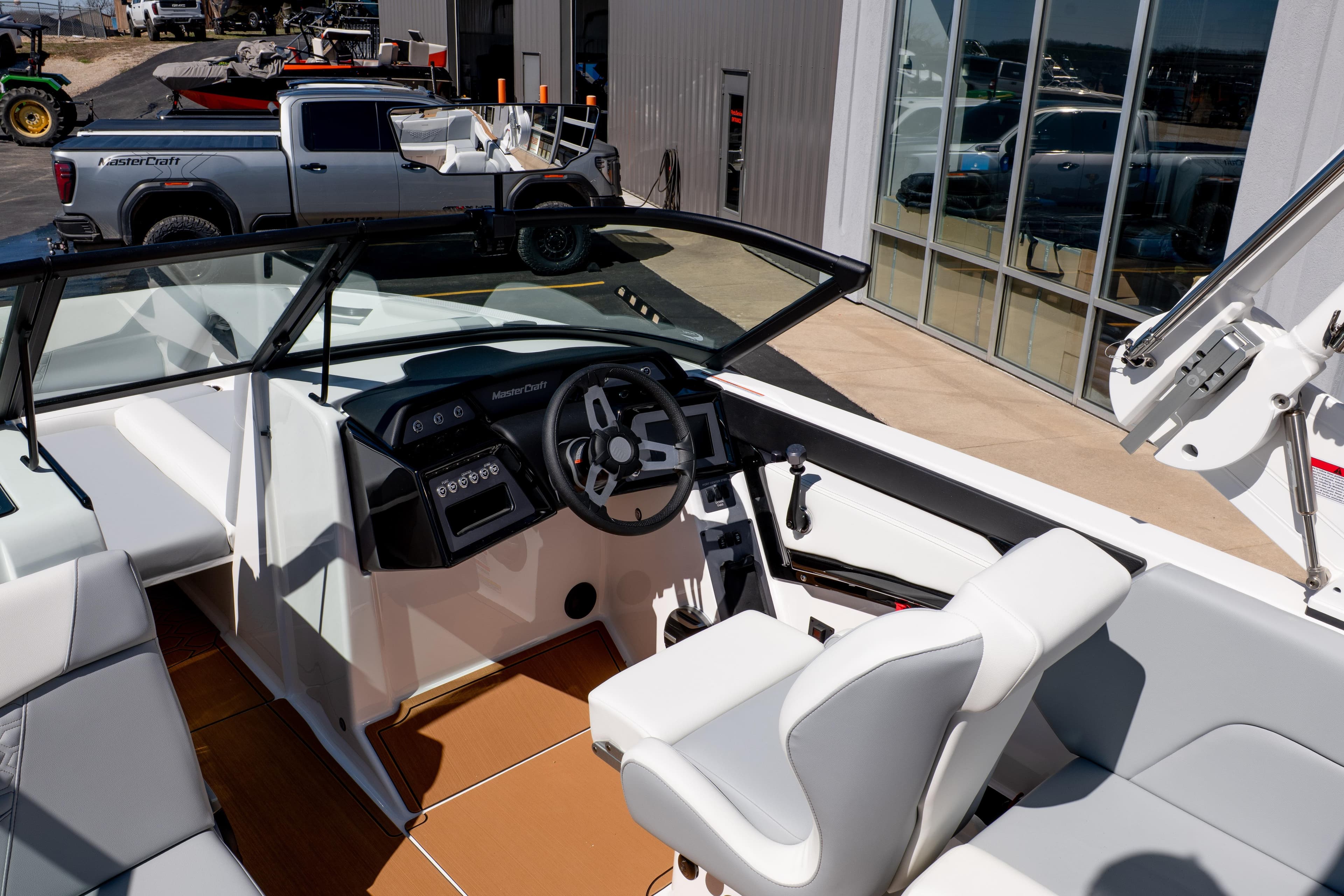 2026 MasterCraft NXT24 boat interior with modern dashboard and seating.