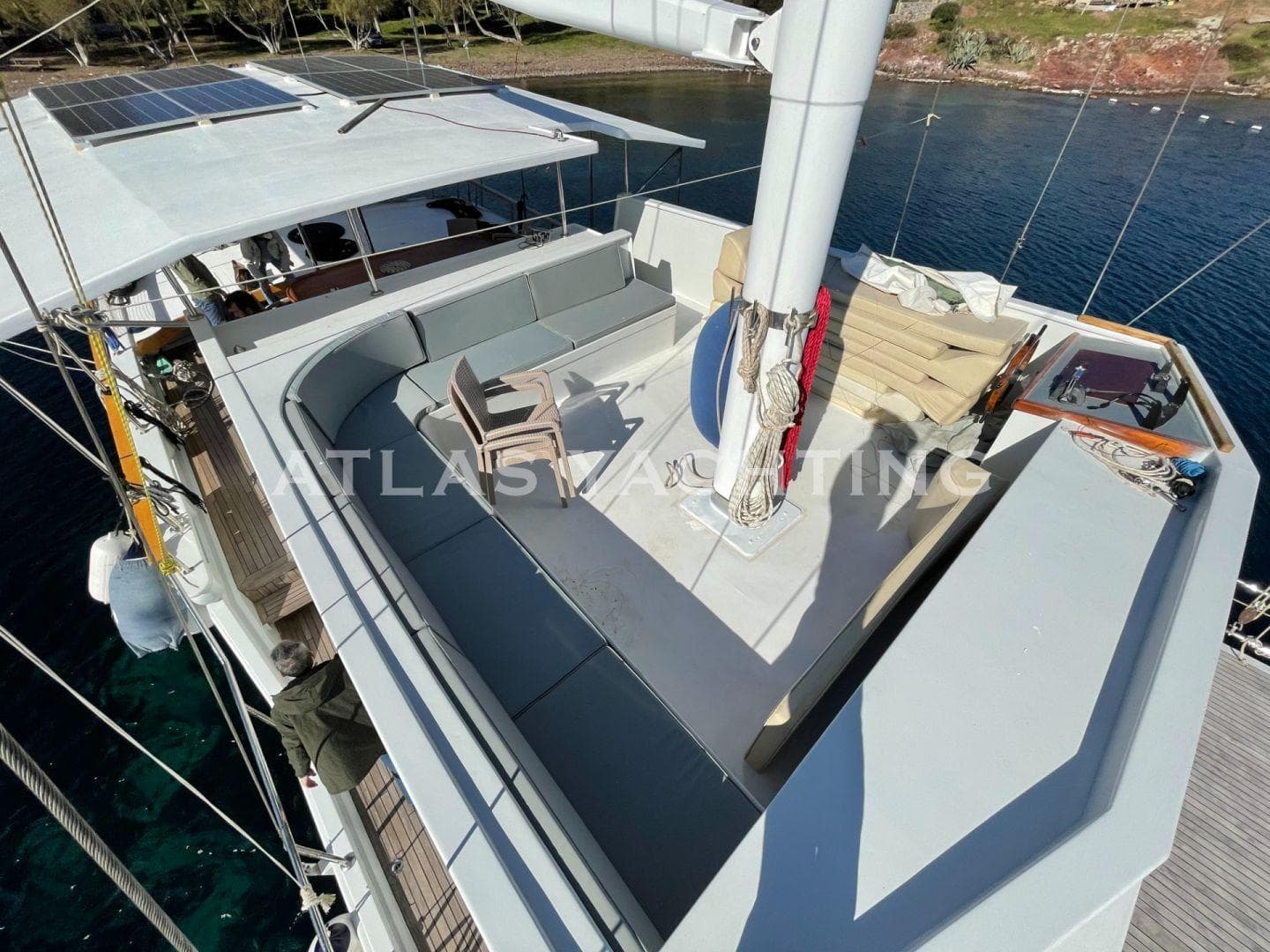 Spacious deck of 2020 rebuilt Gulet with seating, overlooking serene waters.