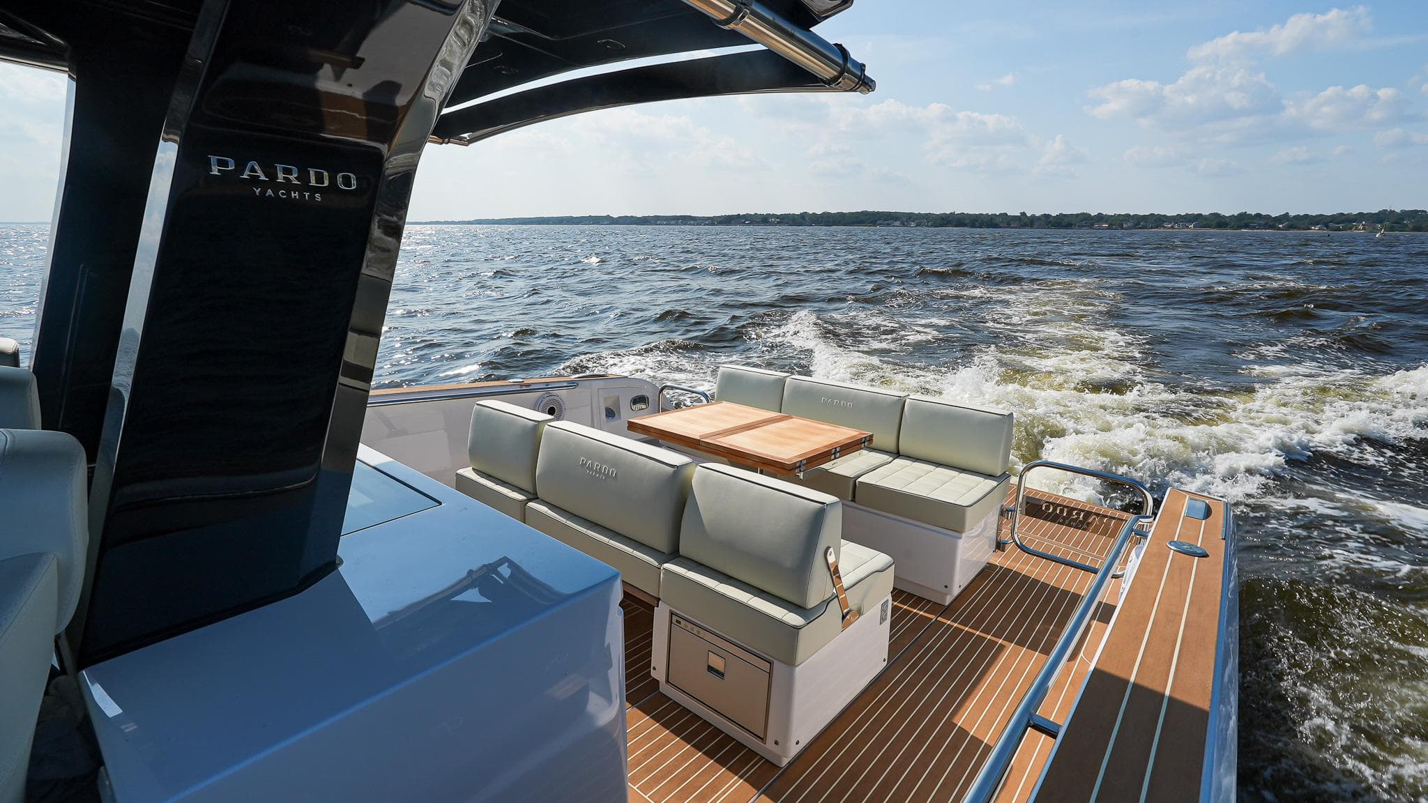 2025 Pardo Yachts 38 Walkaround cruising on open water, featuring elegant deck seating.