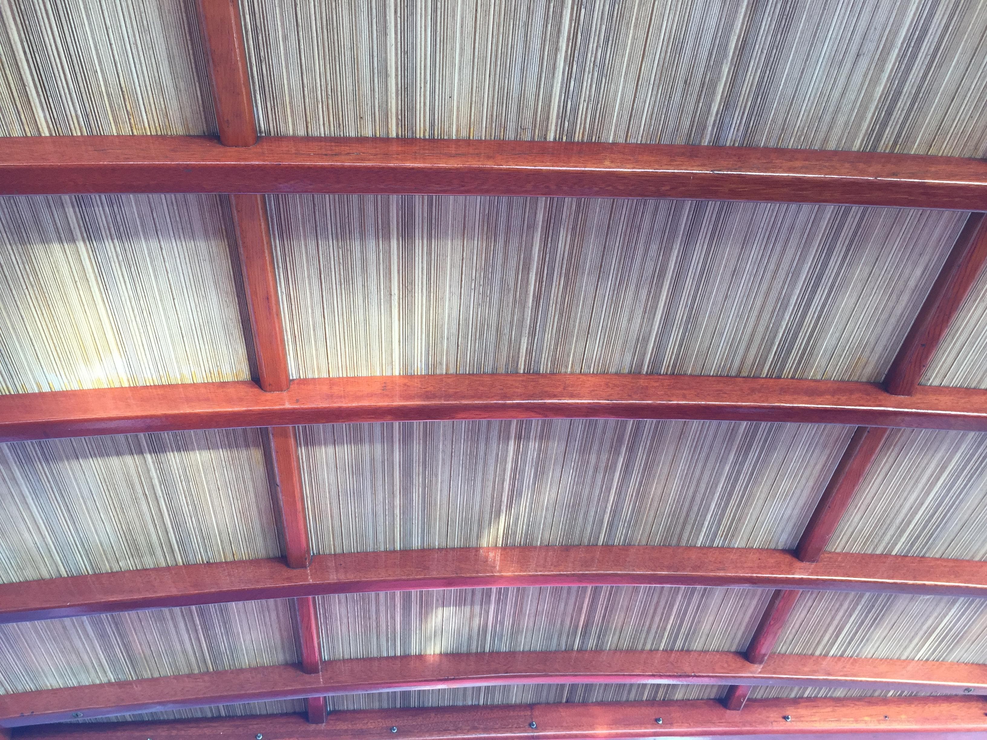 1954 Chris-Craft Commander wooden ceiling with elegant curved beams.