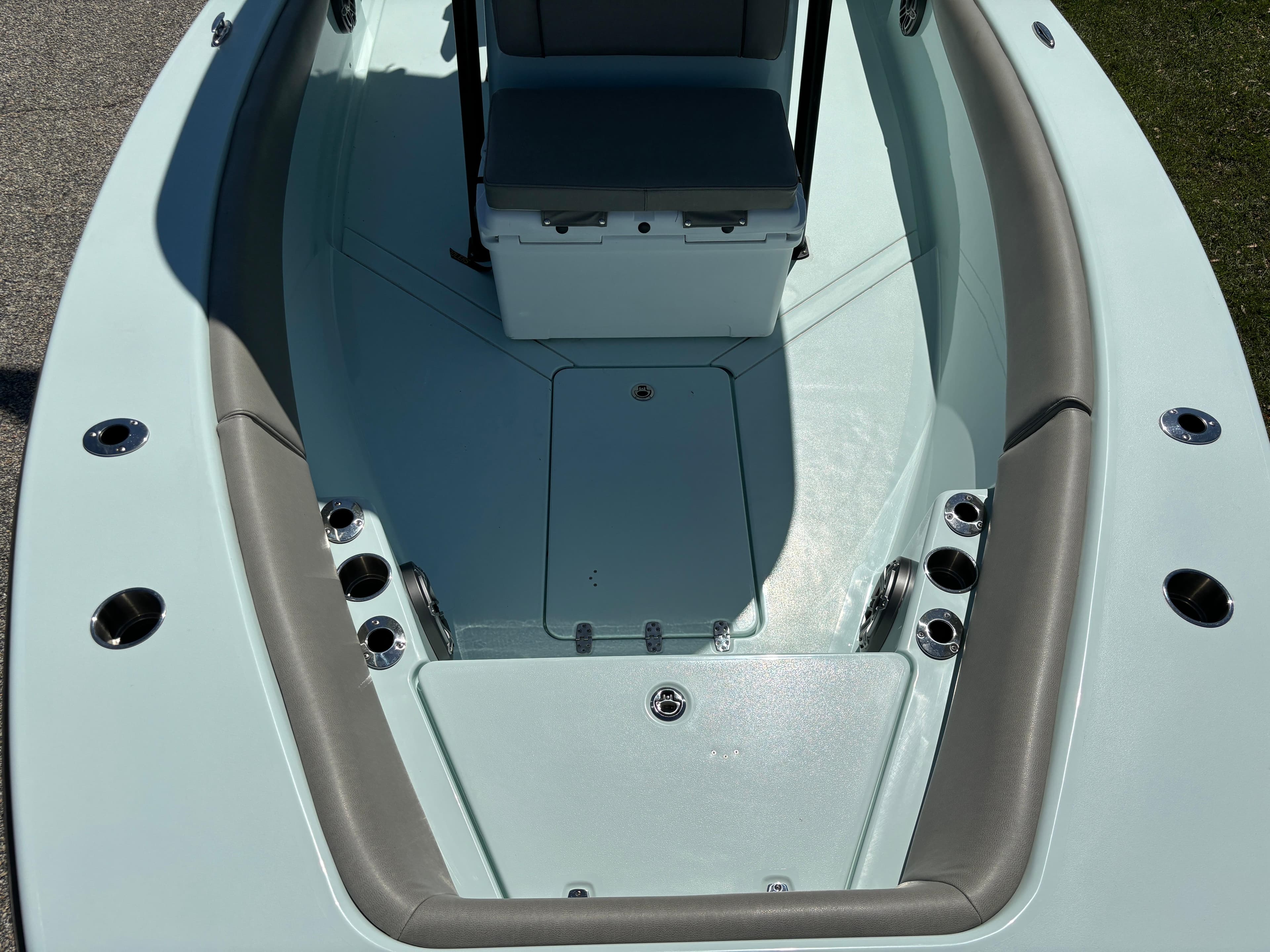 Clark Sound 24 boat interior, 2024 model, featuring seating and storage compartments.