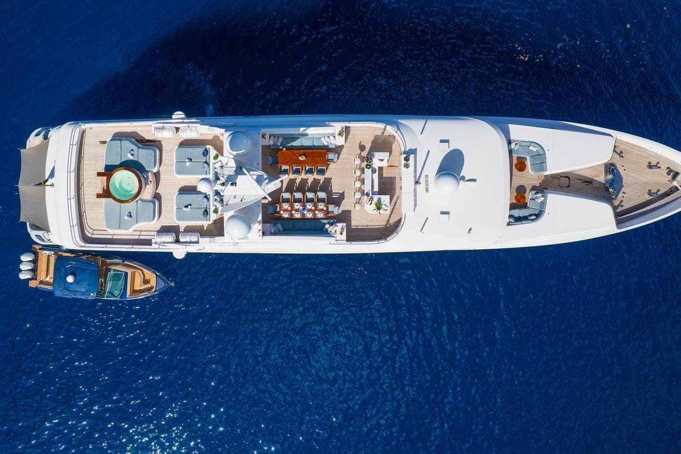 Aerial view of 2006 Mondomarine motor yacht on deep blue sea.