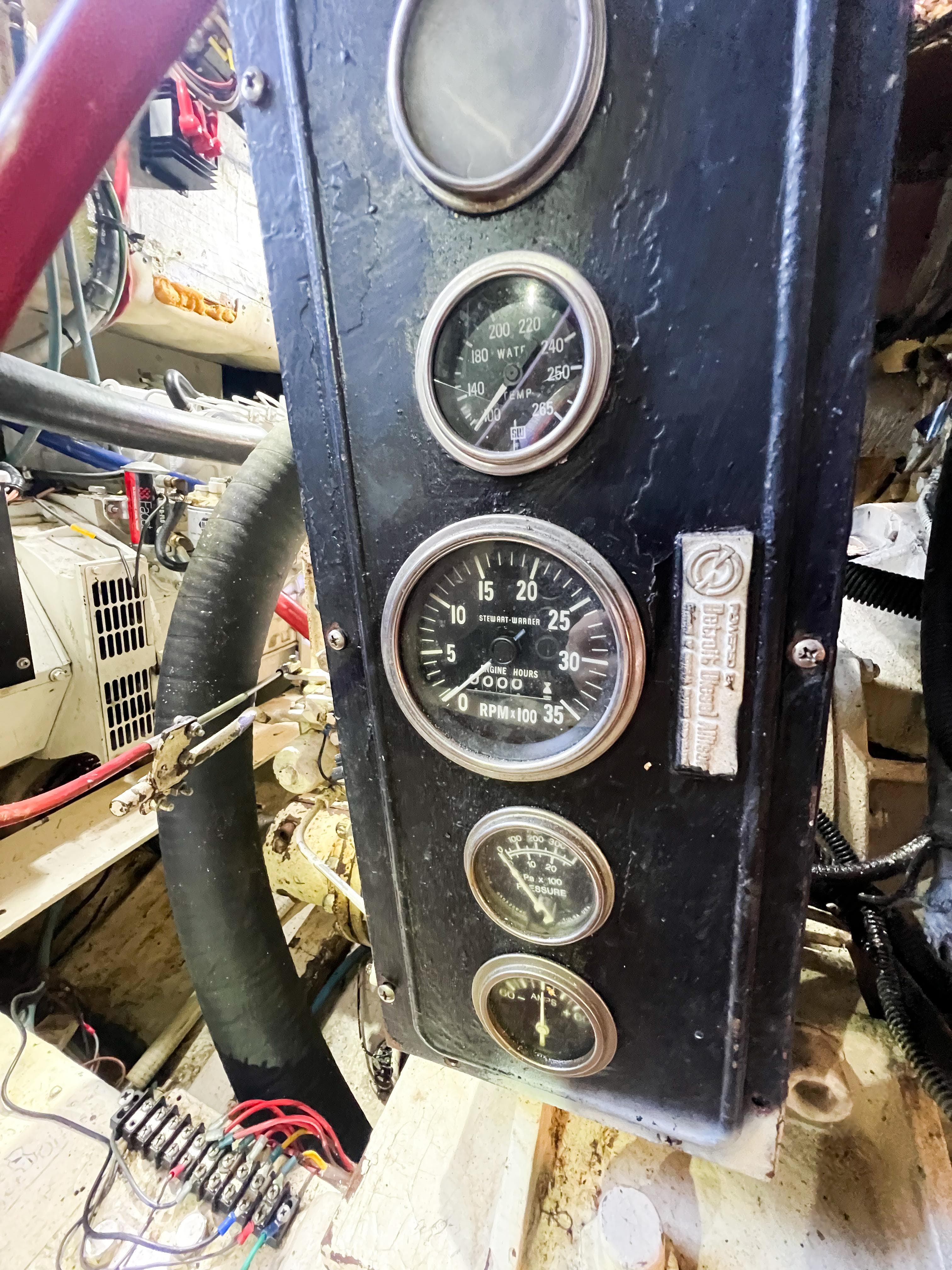 Control panel with gauges in a 1987 Buddy Davis 61 Convertible boat.