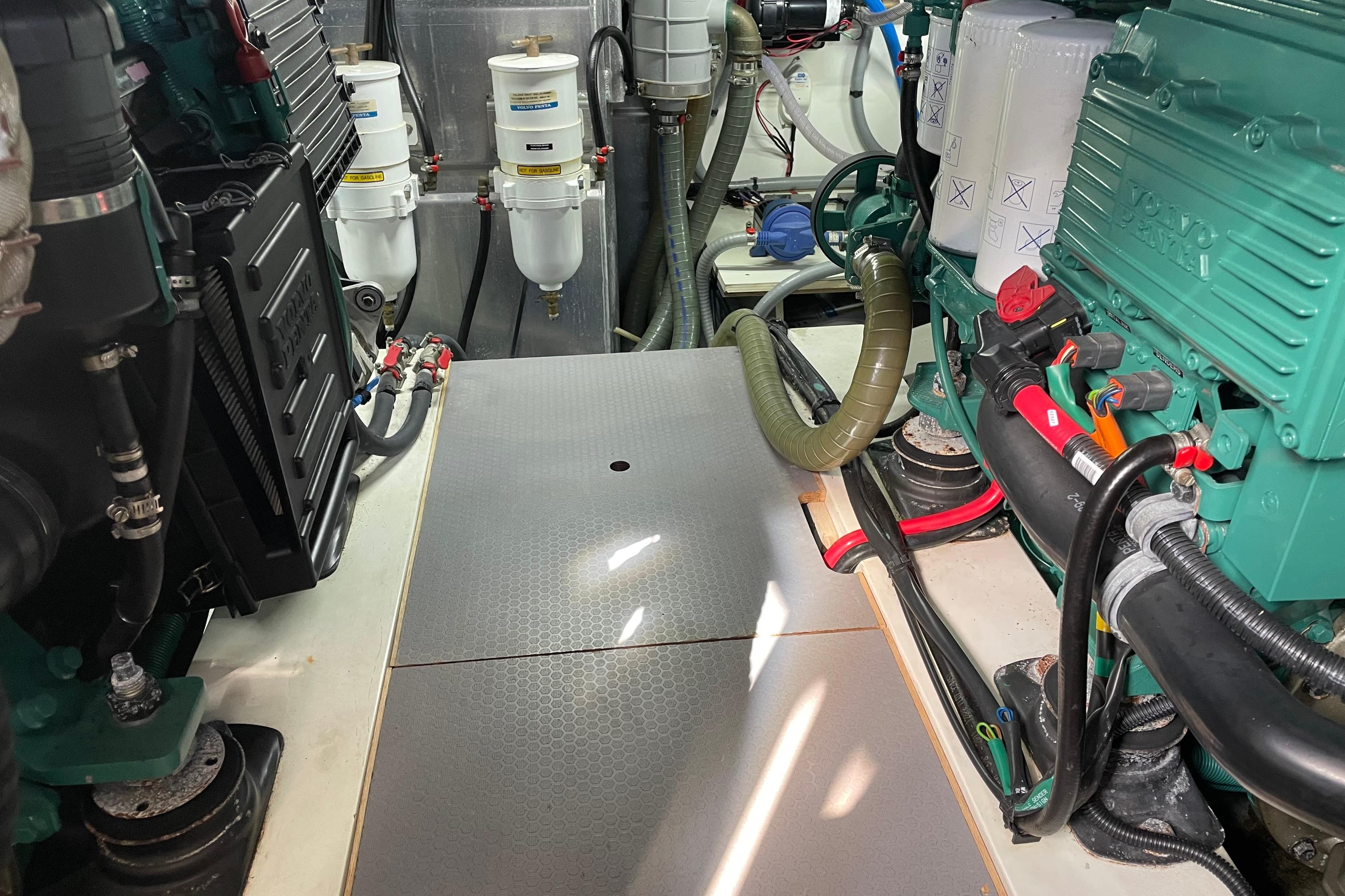Engine room of a 2013 Beneteau Swift Trawler 44 with Volvo Penta components.