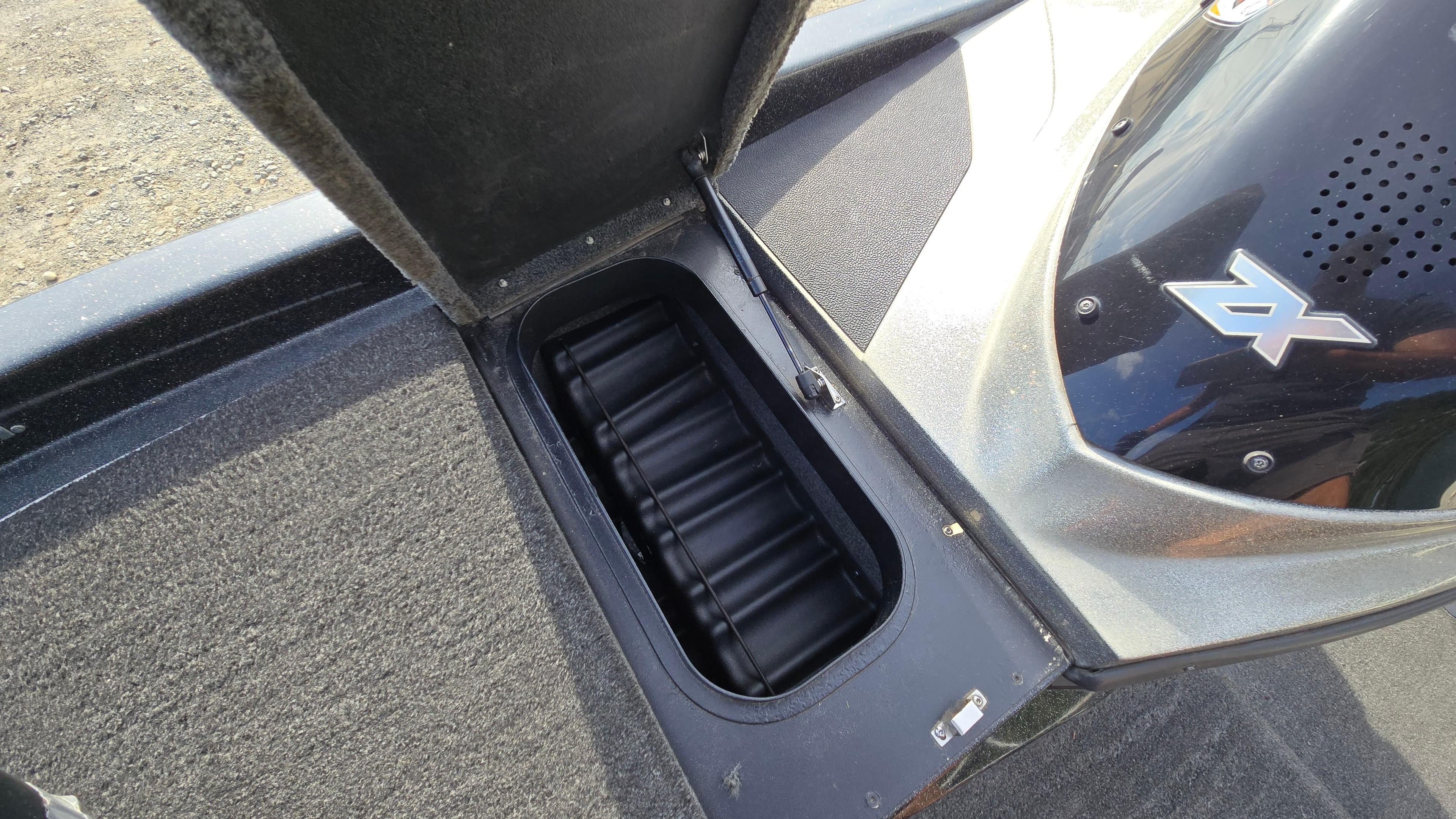 2017 Skeeter ZX 250 boat storage compartment open, showing interior details.