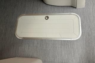 2026 Sweetwater 2286SFL boat floor hatch on textured surface.
