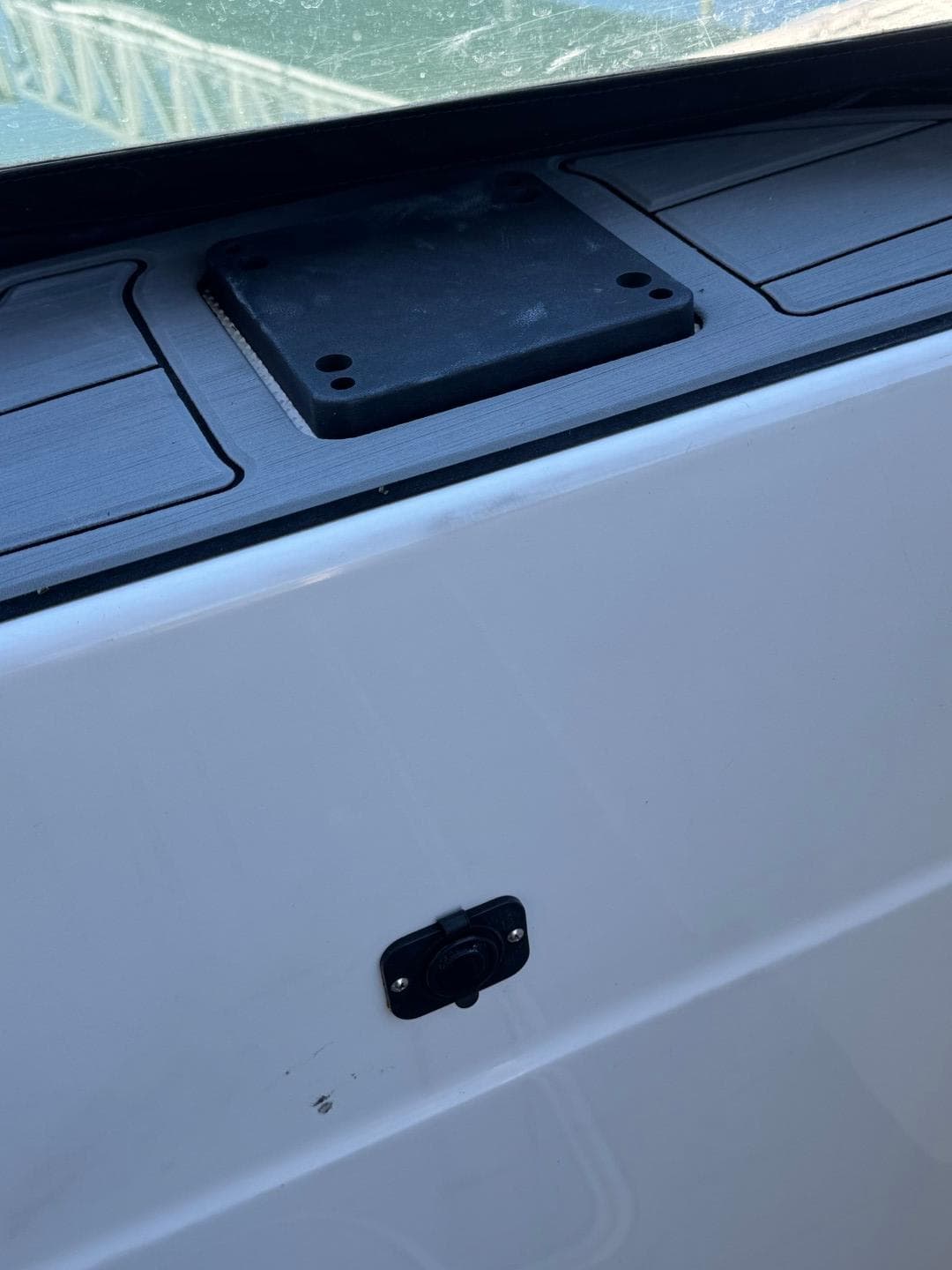 2003 Meridian 381 Sedan boat detail, featuring a sleek white exterior and deck fittings.