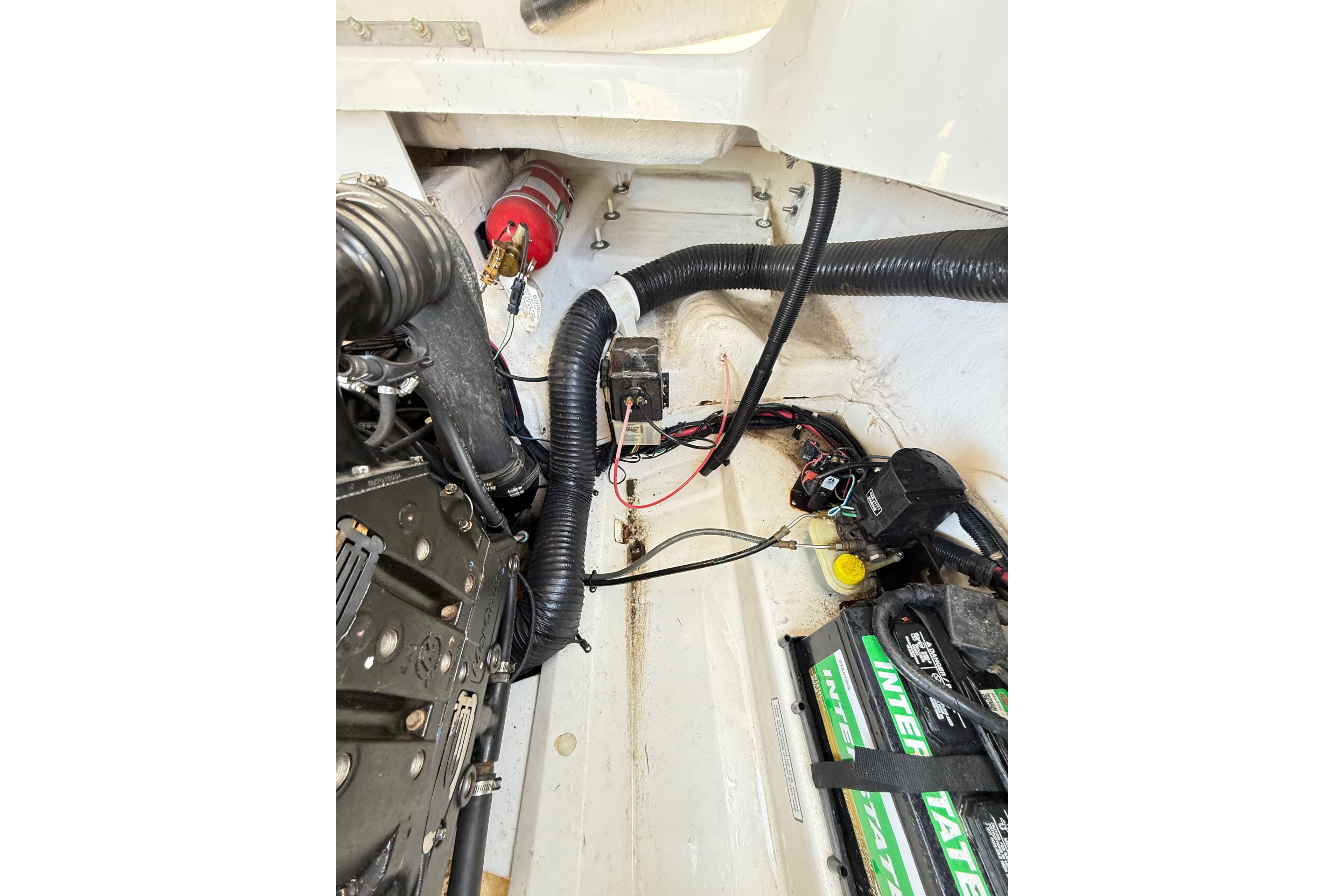 Engine compartment of a 2011 Sea Ray 270 SLX boat, showing wiring and components.